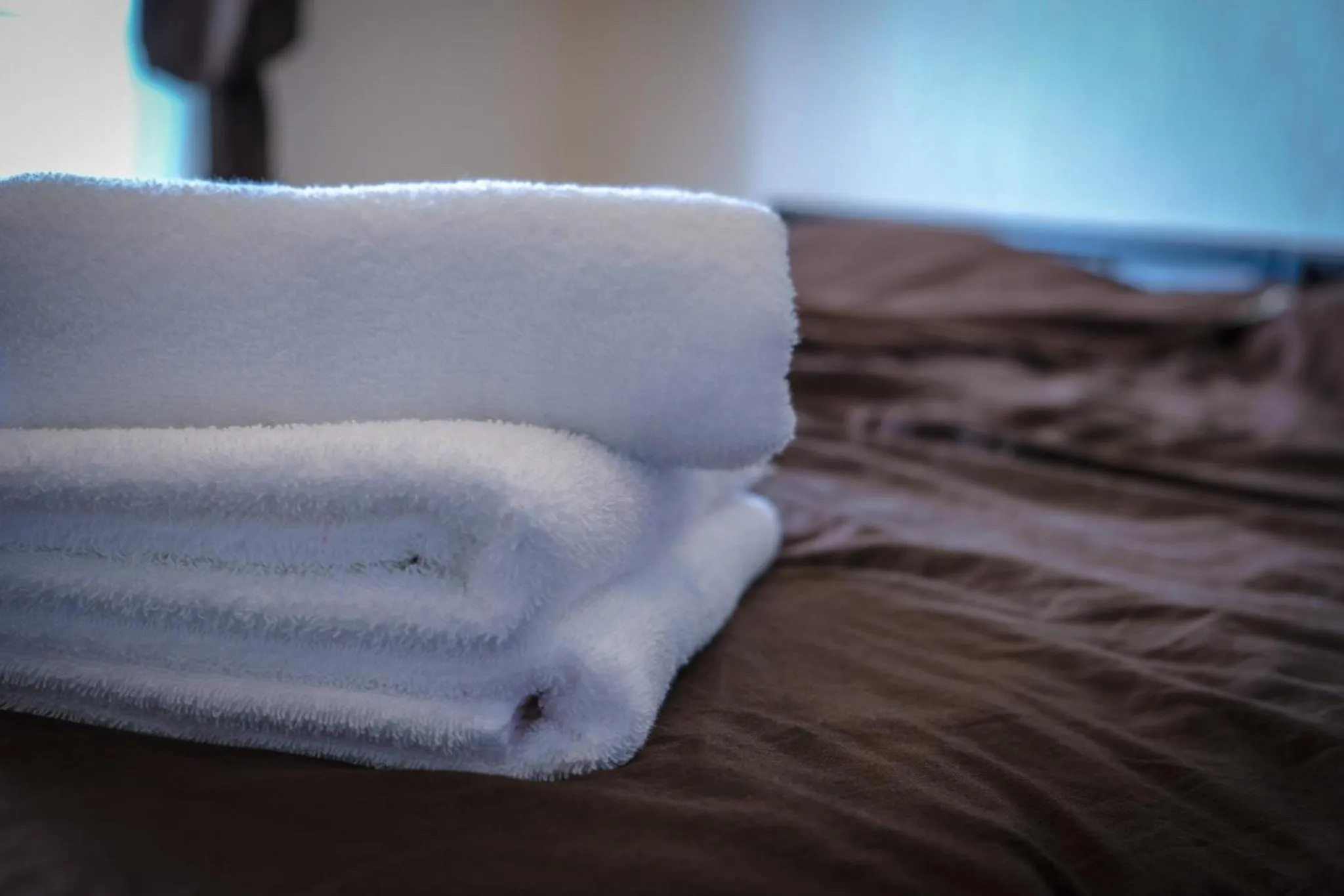 towels, Bed in Blue Entrance