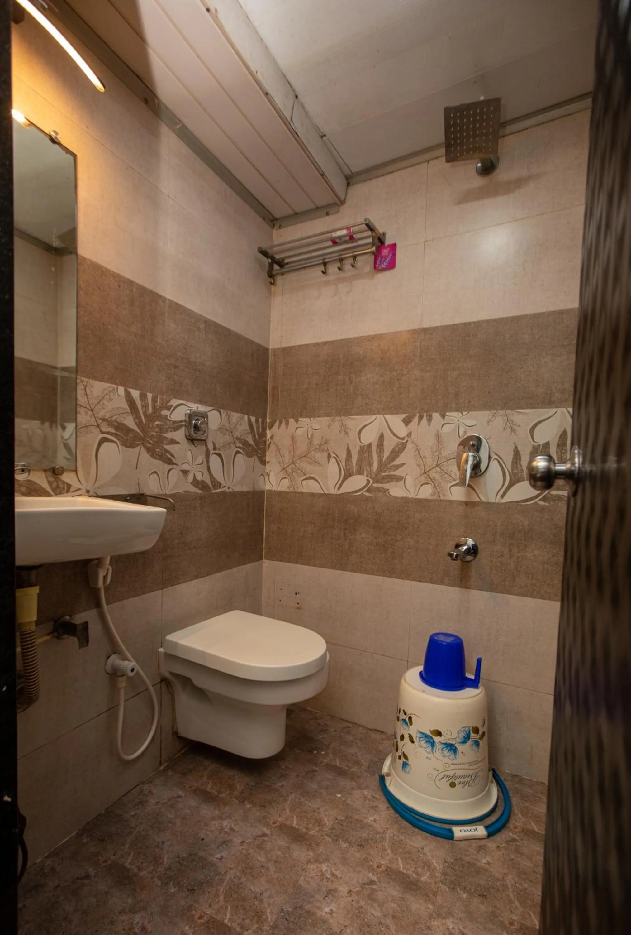 Bathroom in Hotel J D Residency