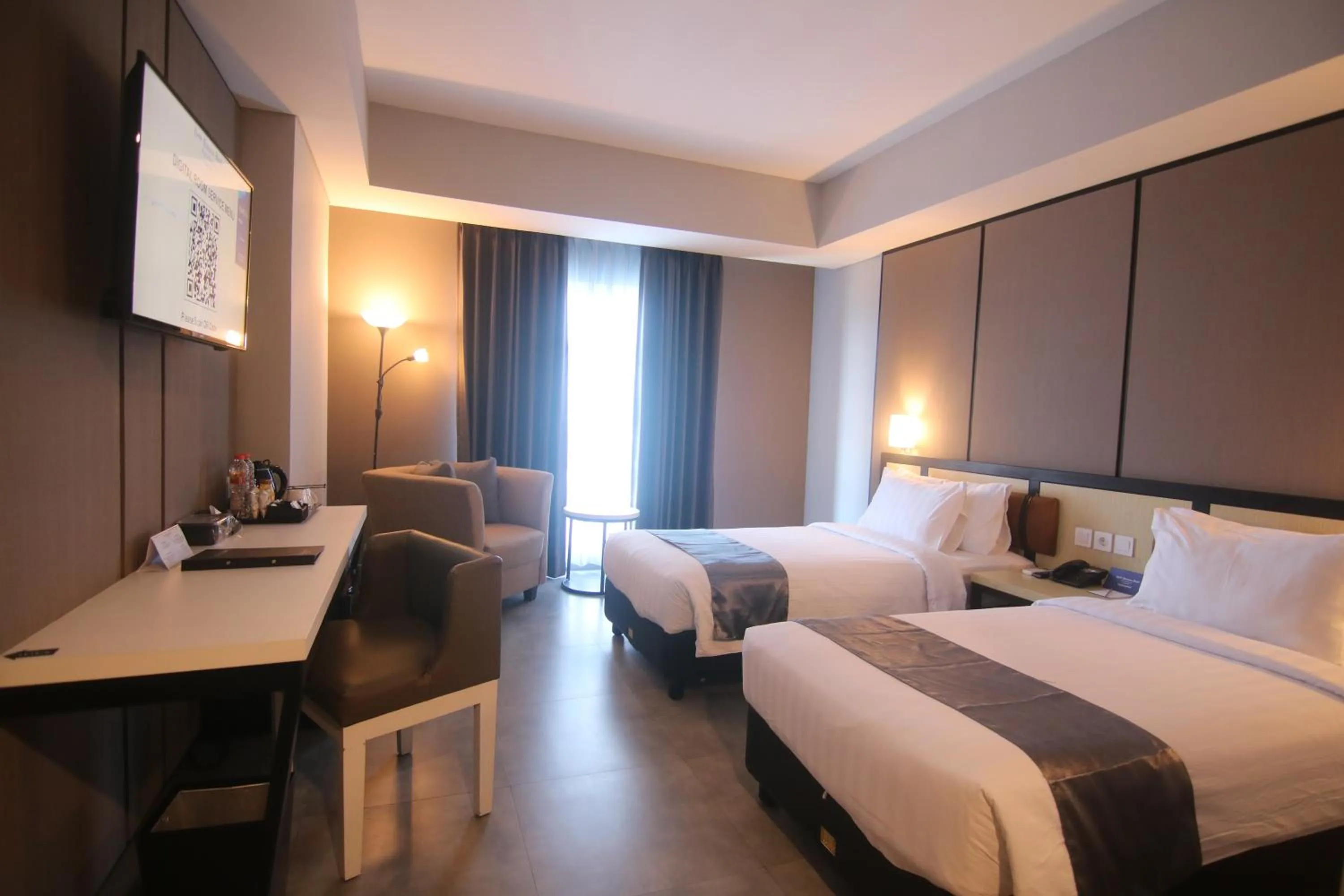 Bed in BeSS Mansion Hotel Surabaya