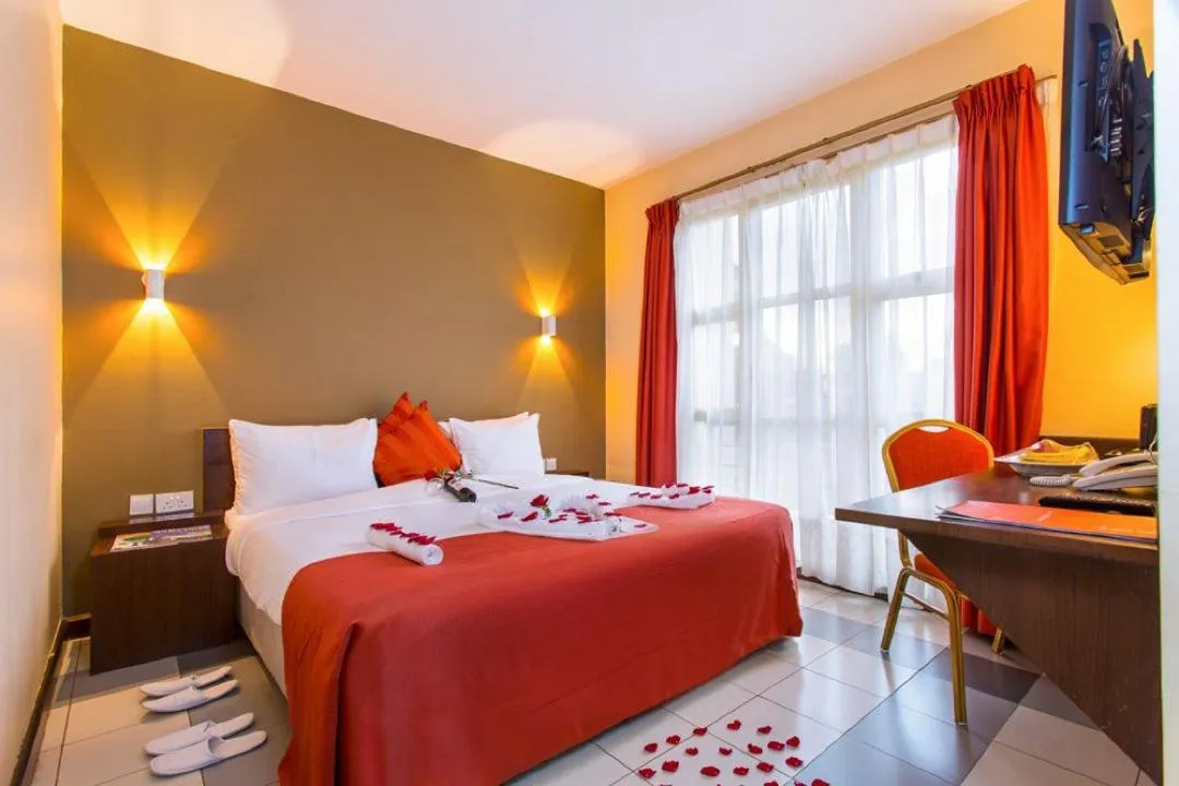 Bed in Qaribu Inn Boutique Hotel Nairobi