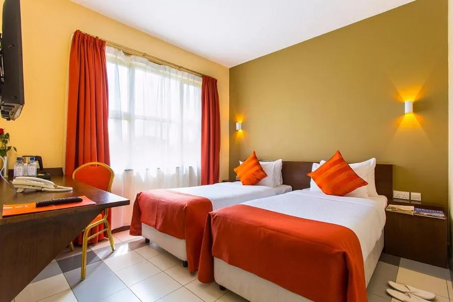 Bed in Qaribu Inn Boutique Hotel Nairobi