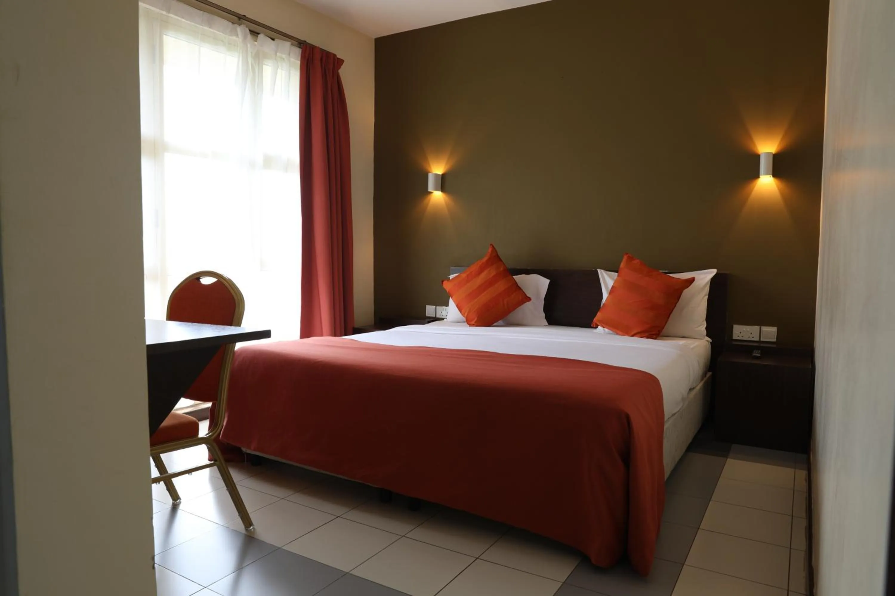 Bed in Qaribu Inn Boutique Hotel Nairobi