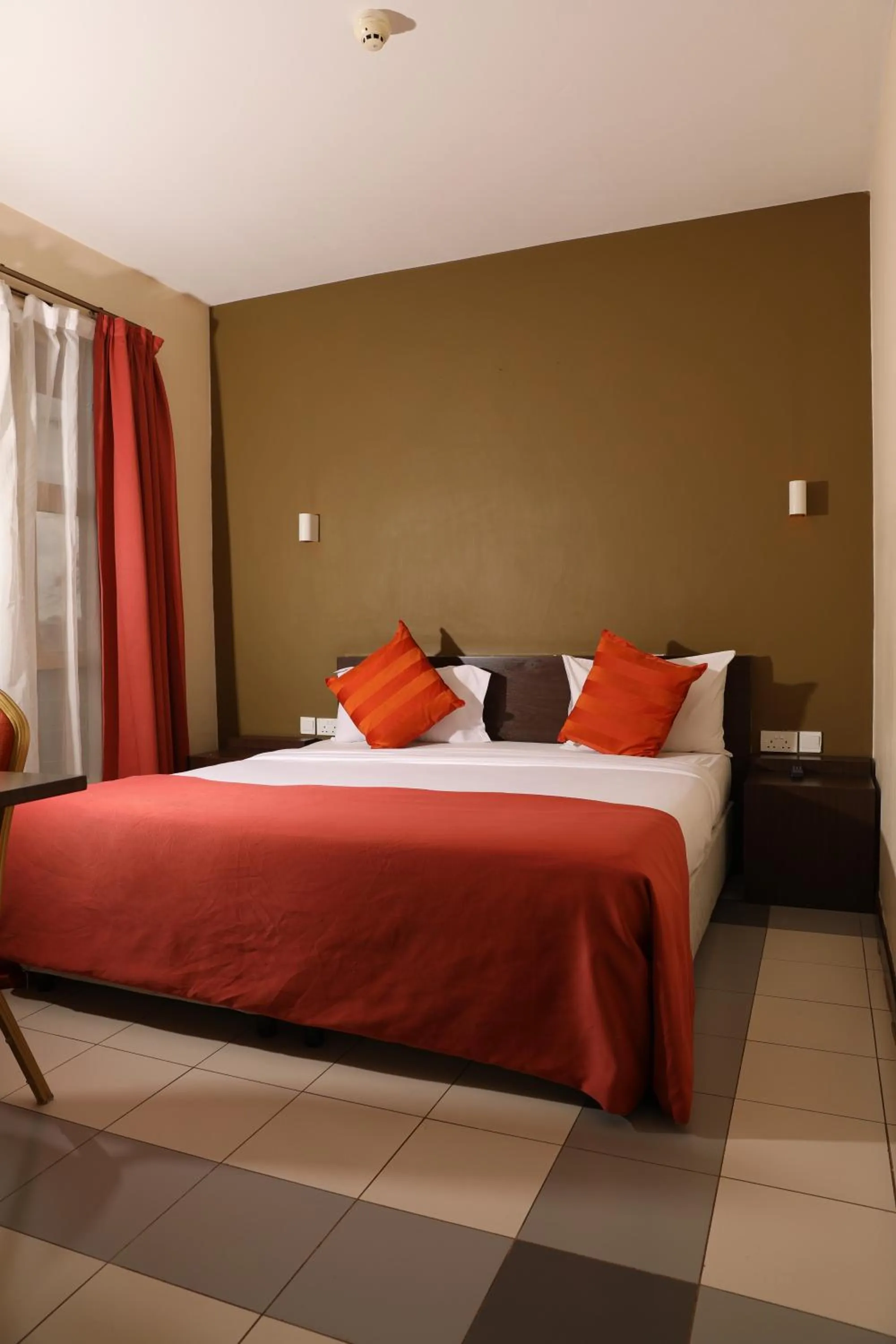 Bed in Qaribu Inn Boutique Hotel Nairobi