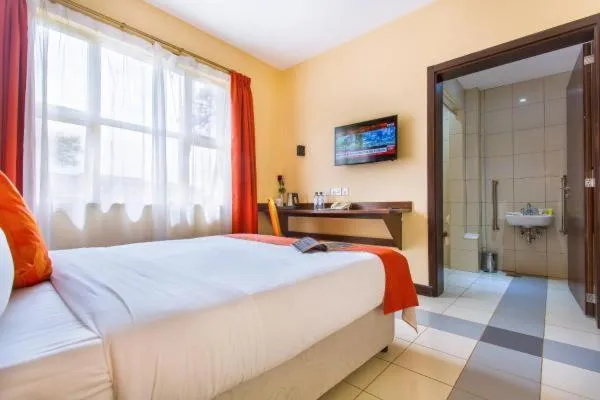 Bed in Qaribu Inn Boutique Hotel Nairobi