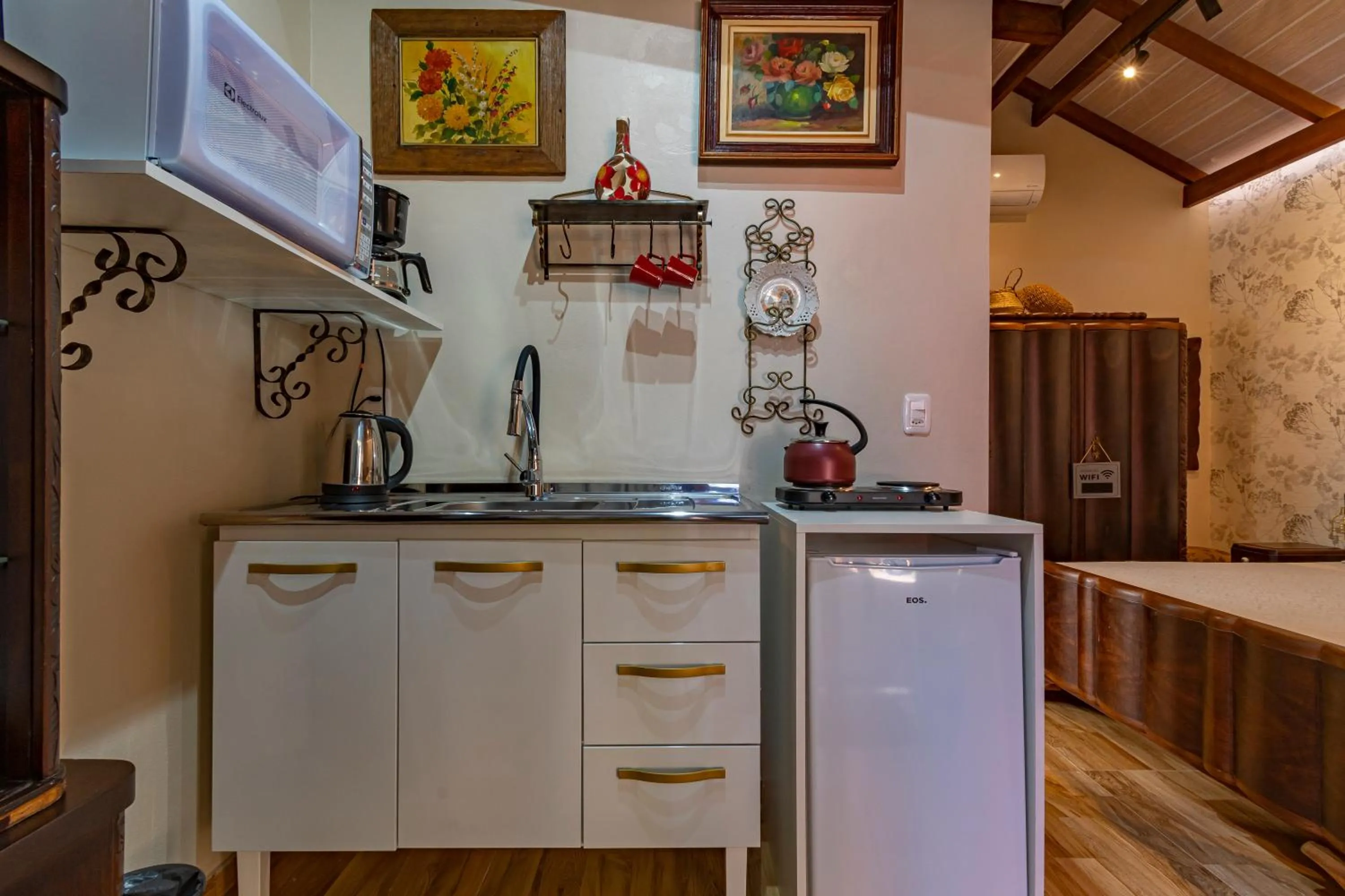 Kitchen or kitchenette in Pousada Vila 505