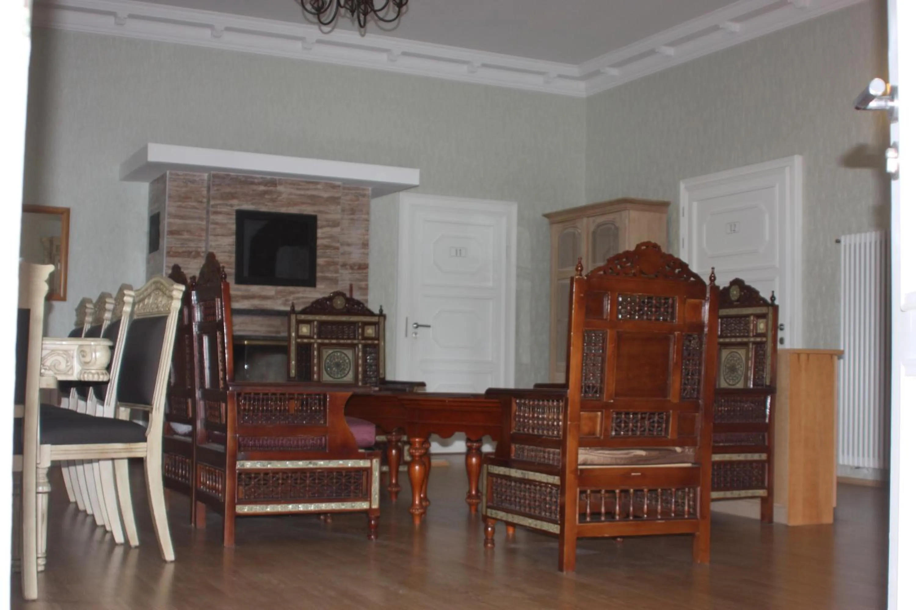 Communal lounge/ TV room in Villa De Baron