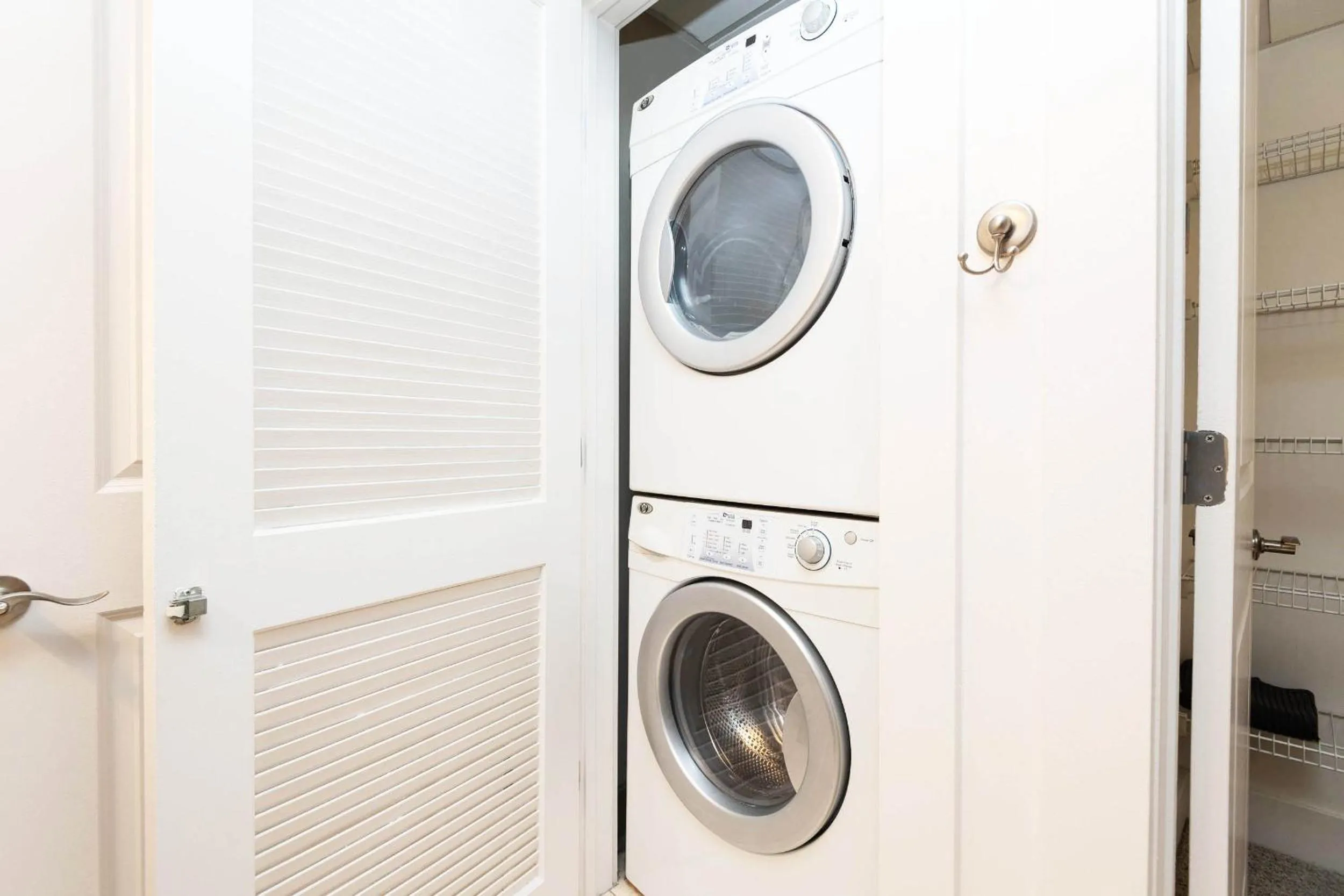 washing machine in Sky-Rise Apartments