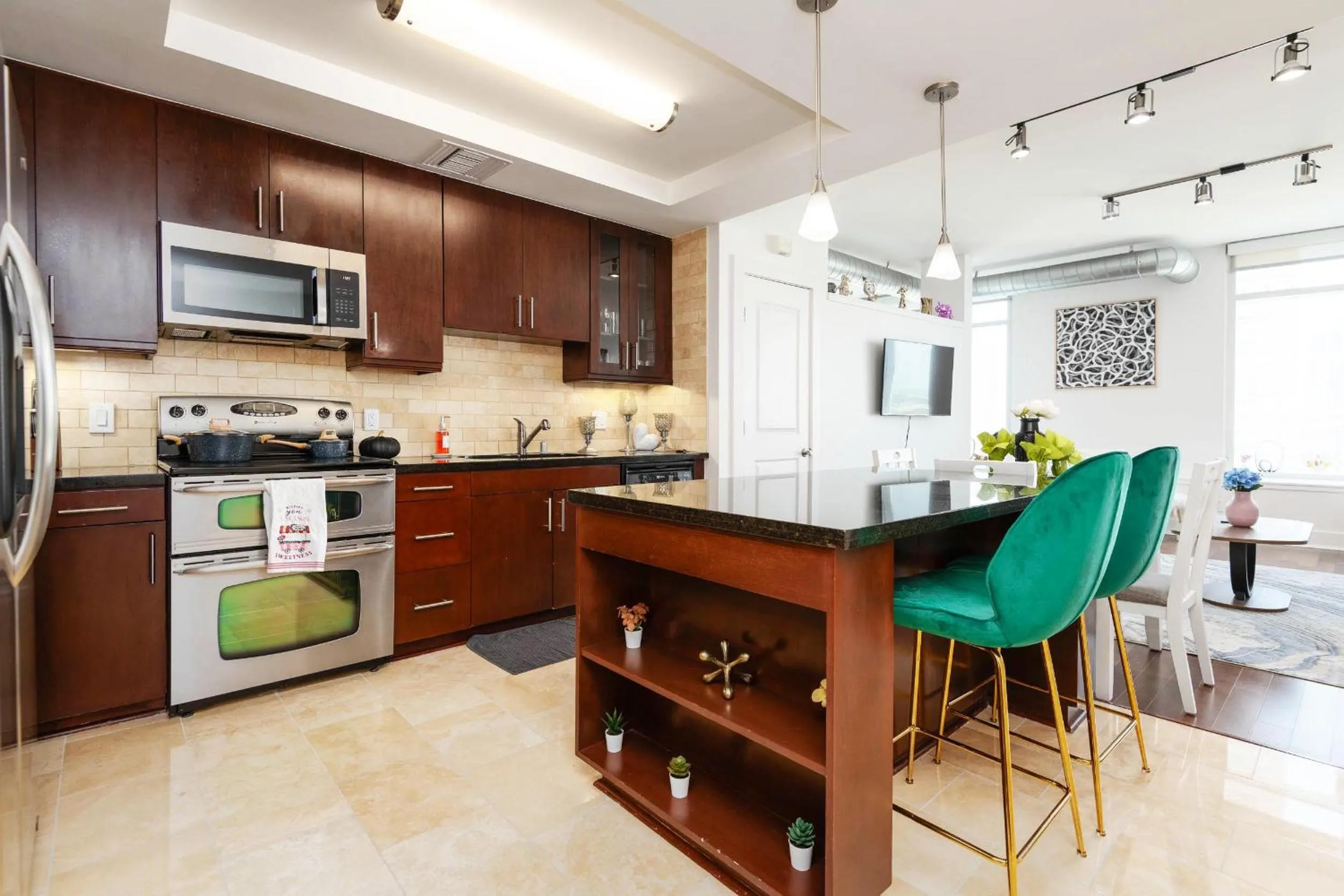 Kitchen or kitchenette in Sky-Rise Apartments