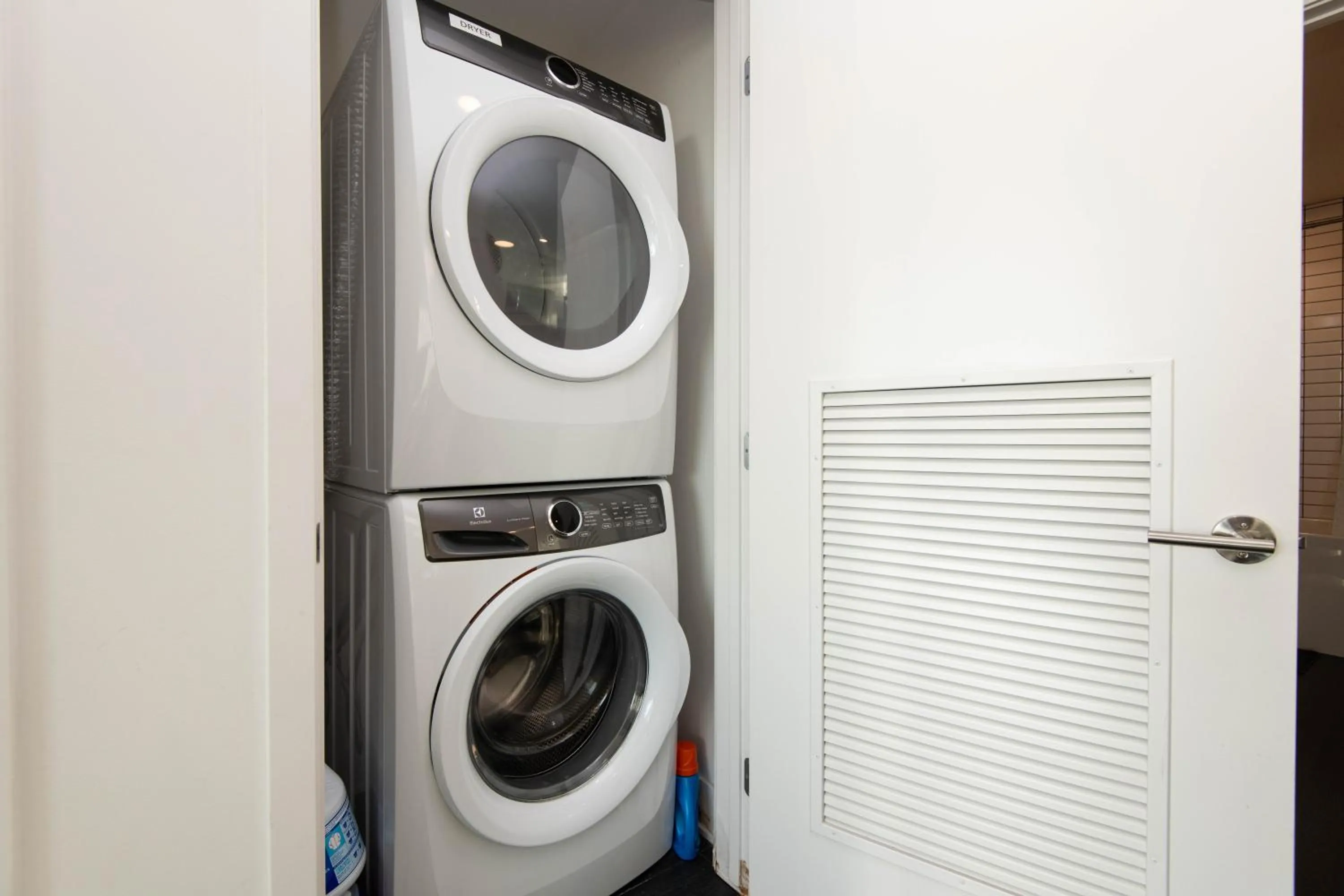 washing machine in Sky-Rise Apartments