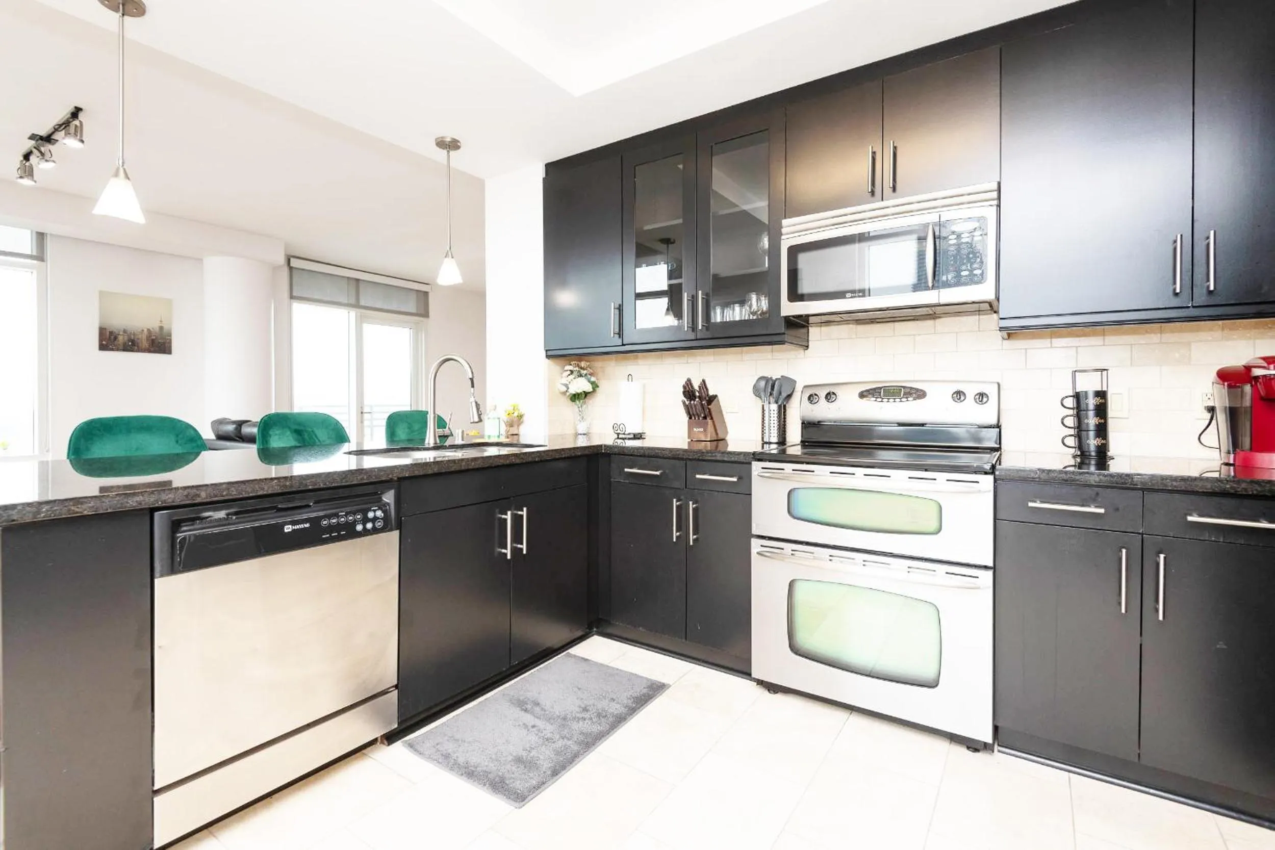 Kitchen or kitchenette in Sky-Rise Apartments