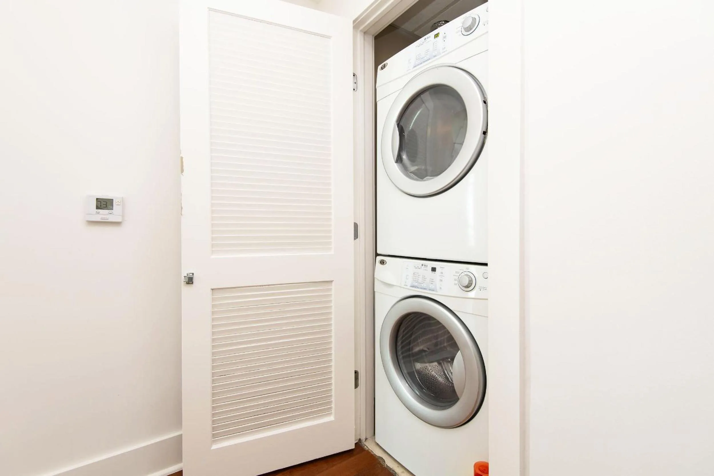 washing machine in Sky-Rise Apartments