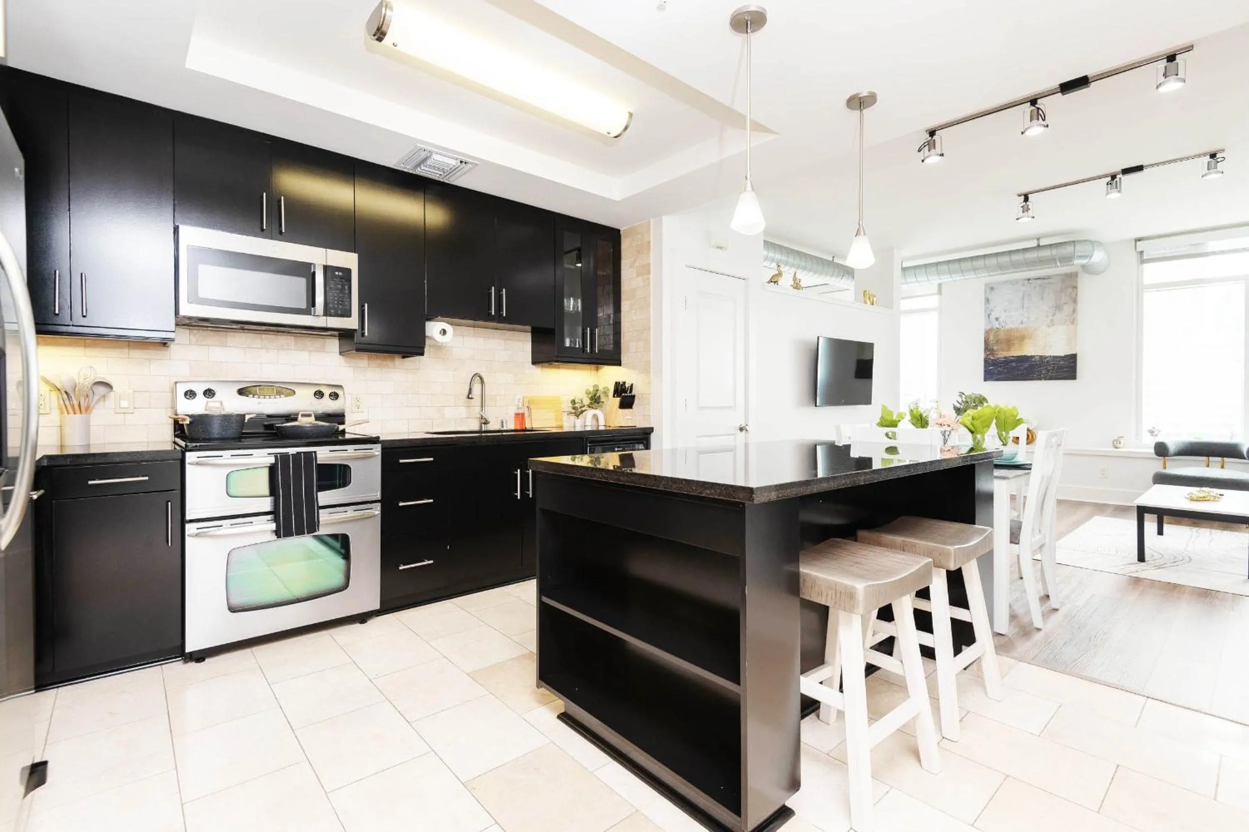 Kitchen or kitchenette in Sky-Rise Apartments