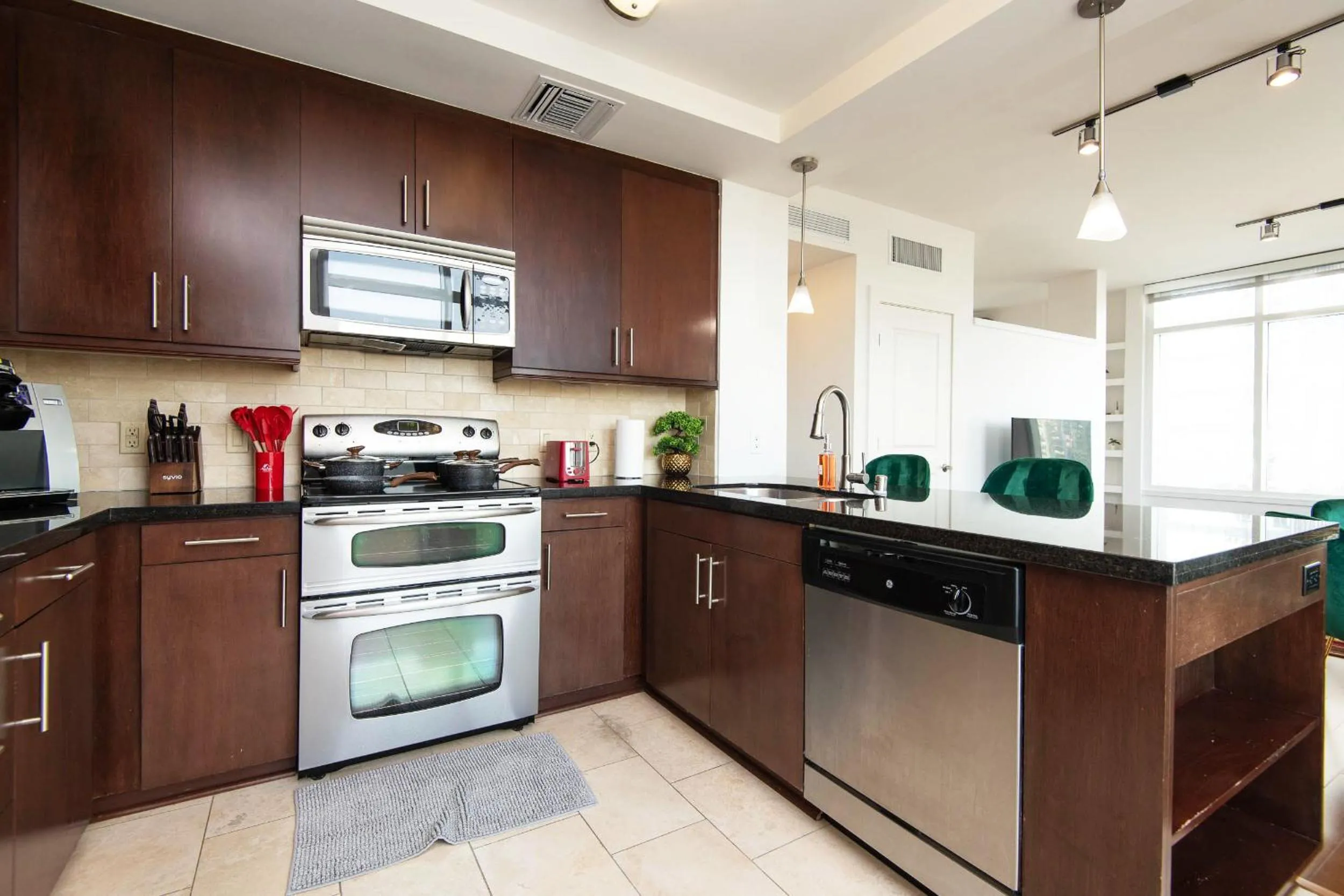 Kitchen or kitchenette in Sky-Rise Apartments