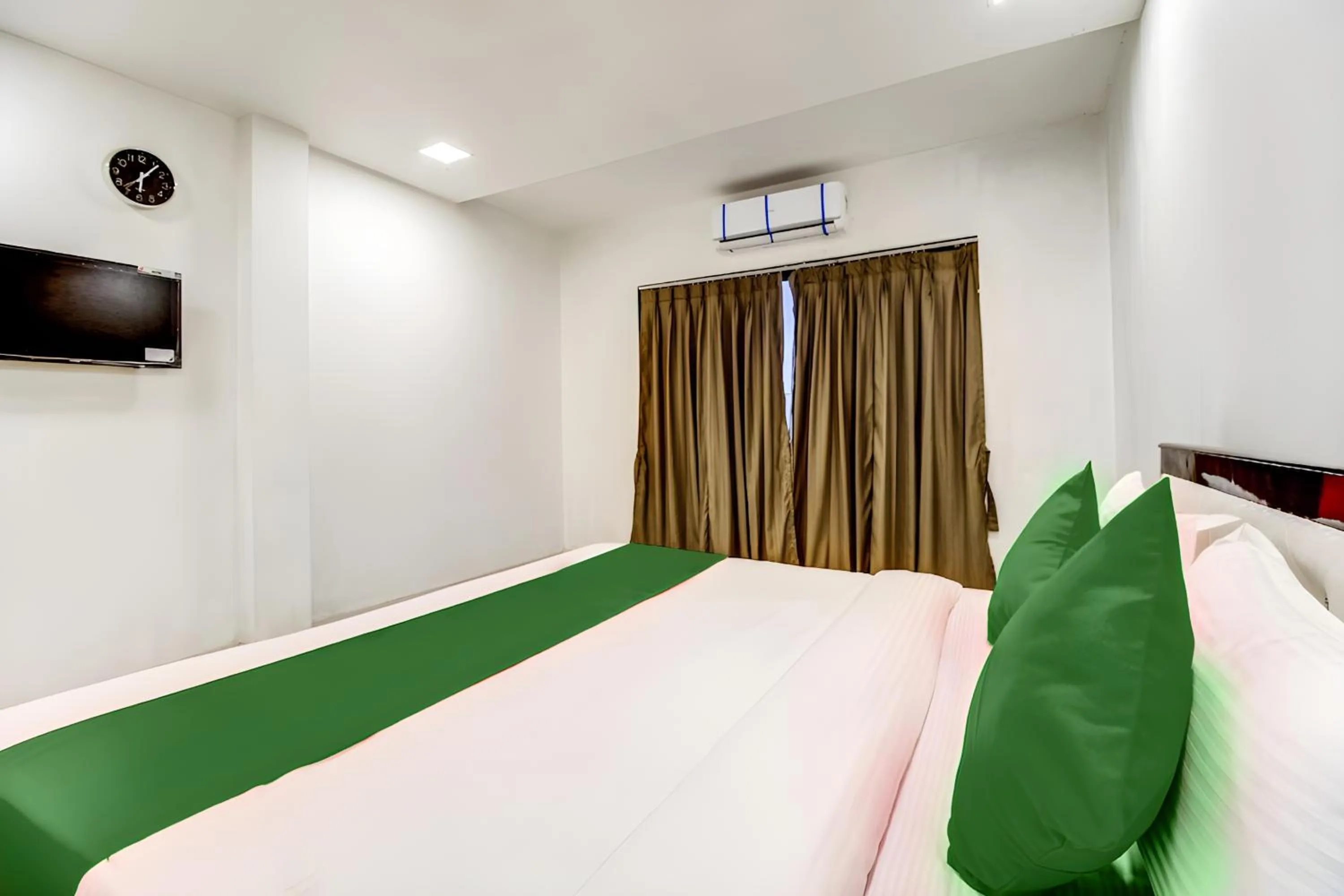 Bed in KK Tree Retreat Igatpuri