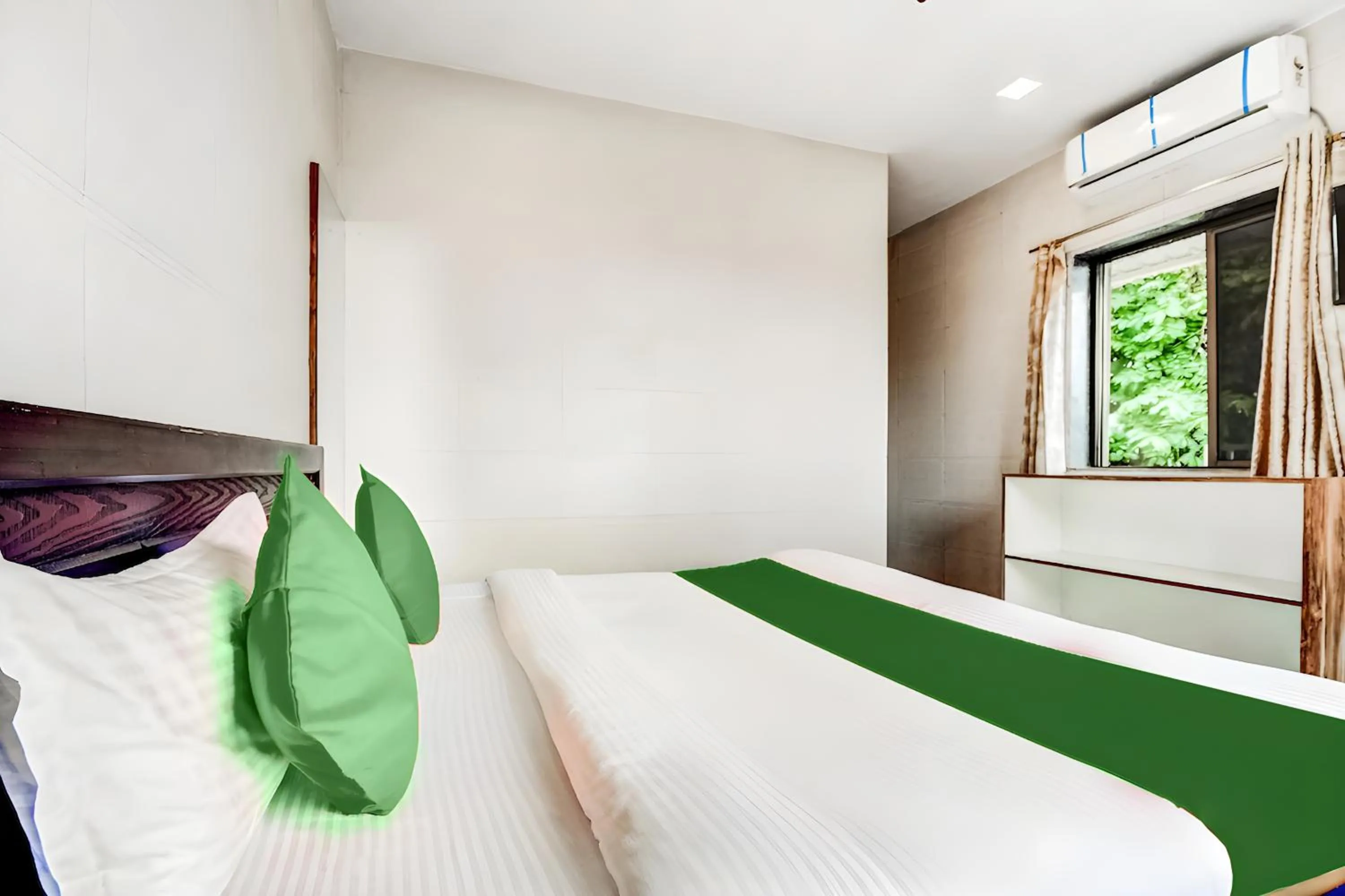 Bed in KK Tree Retreat Igatpuri