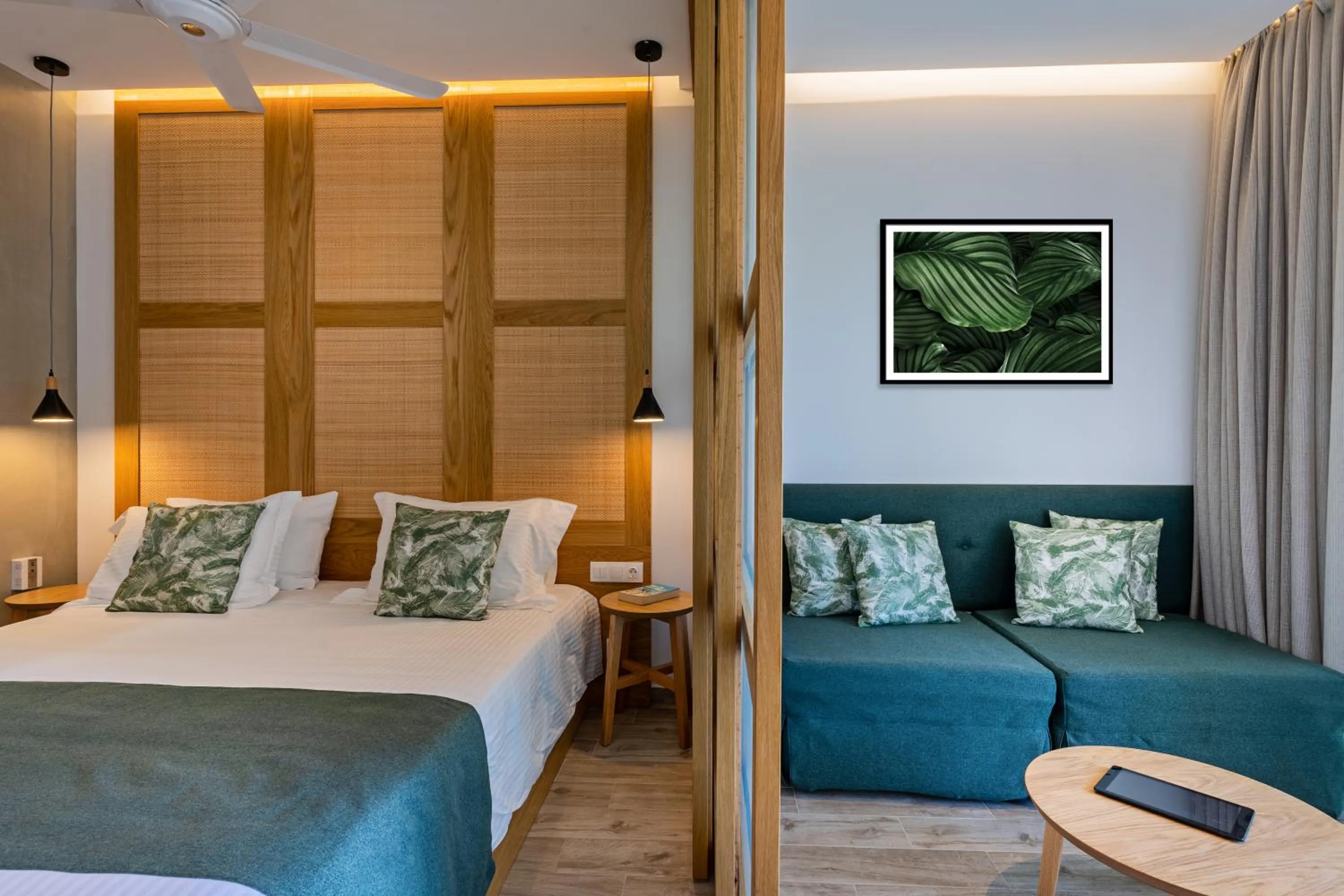 Seating area, Bed in Georgioupolis Suites & Aqua Park