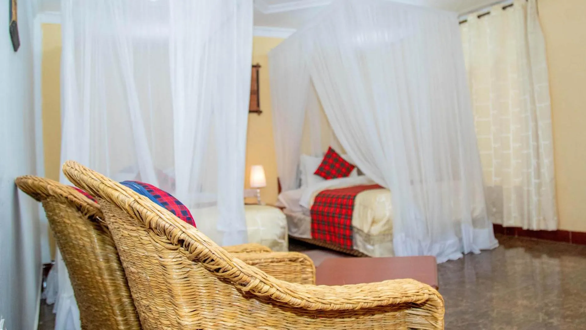 Bed in Karibu Heritage House