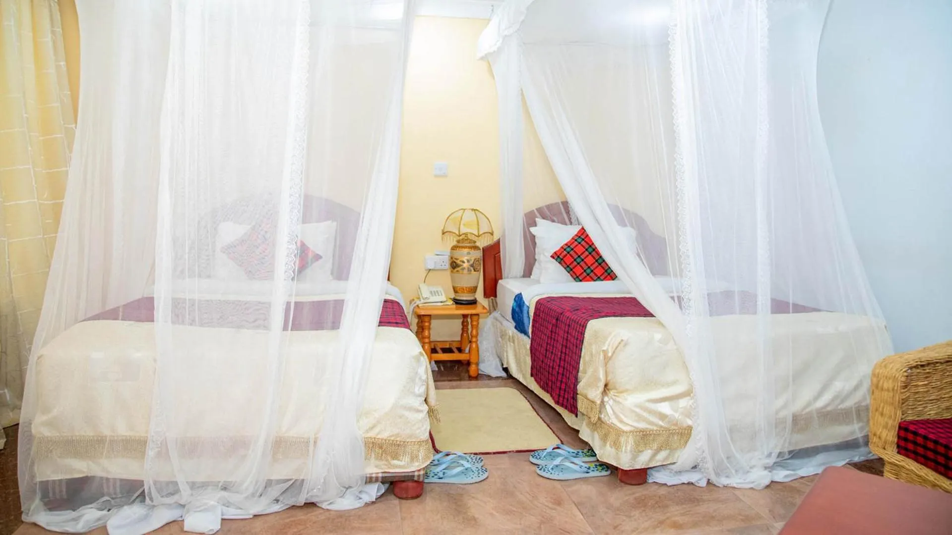 Bed in Karibu Heritage House