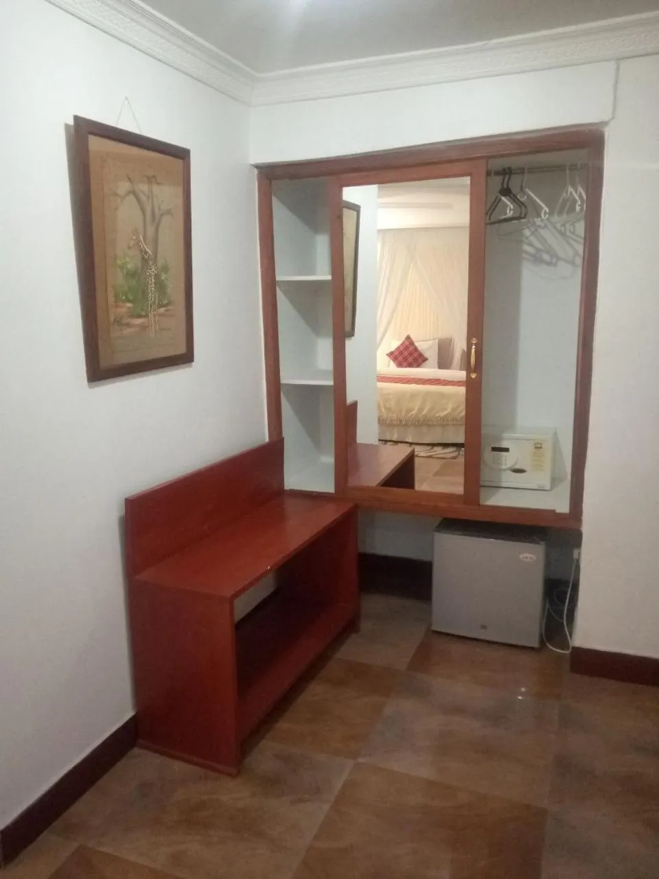 Bed in Karibu Heritage House