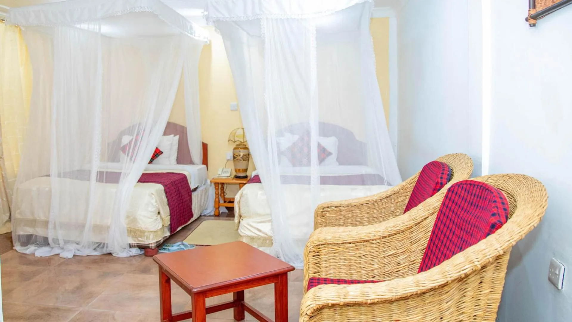 Bed in Karibu Heritage House