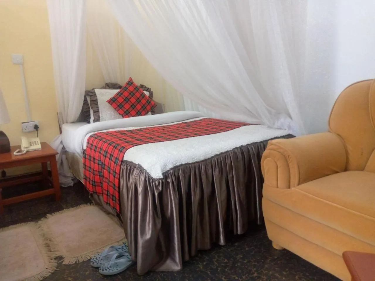 Bed in Karibu Heritage House