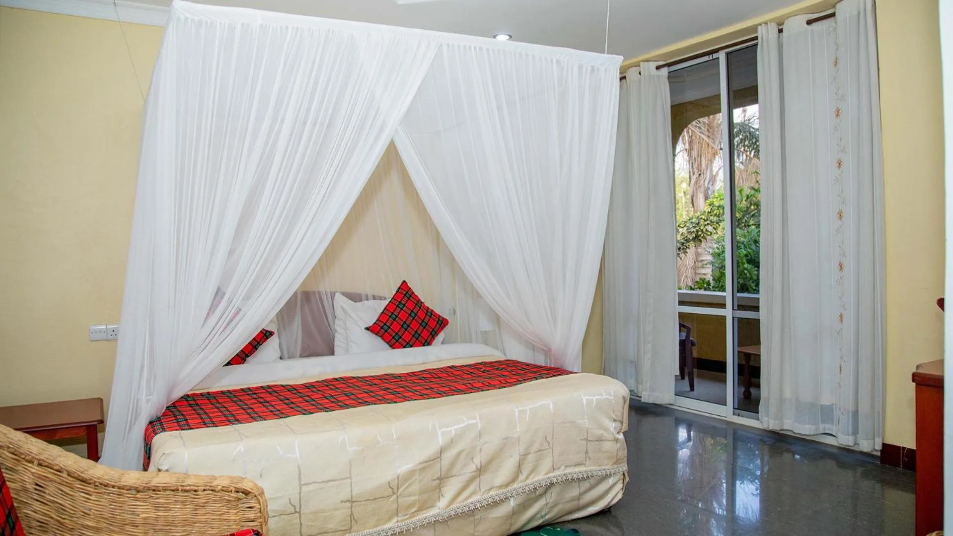 Bed in Karibu Heritage House