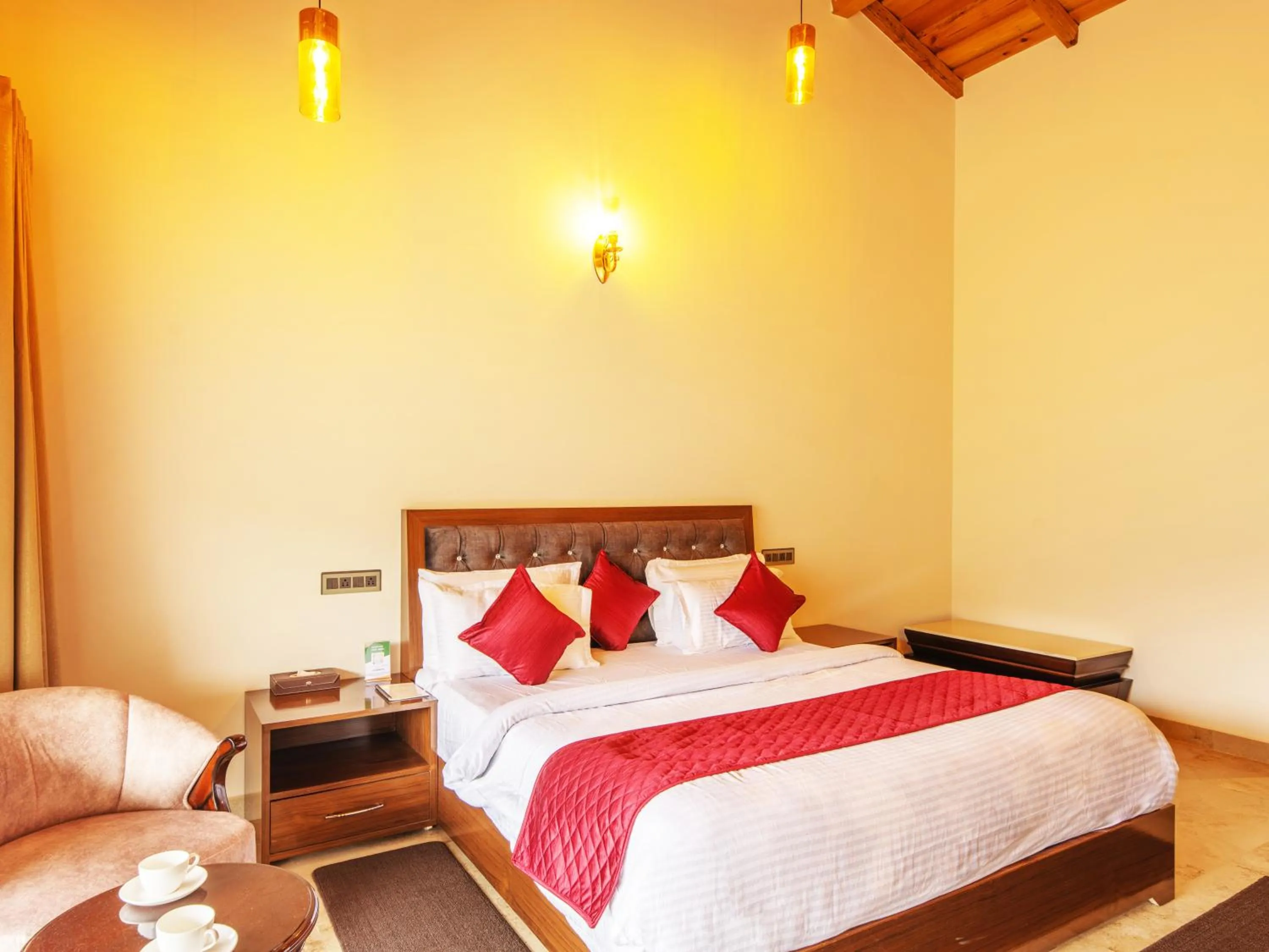 Bed in Captains Paradise Luxury Resort at Mukteshwar Hill Station