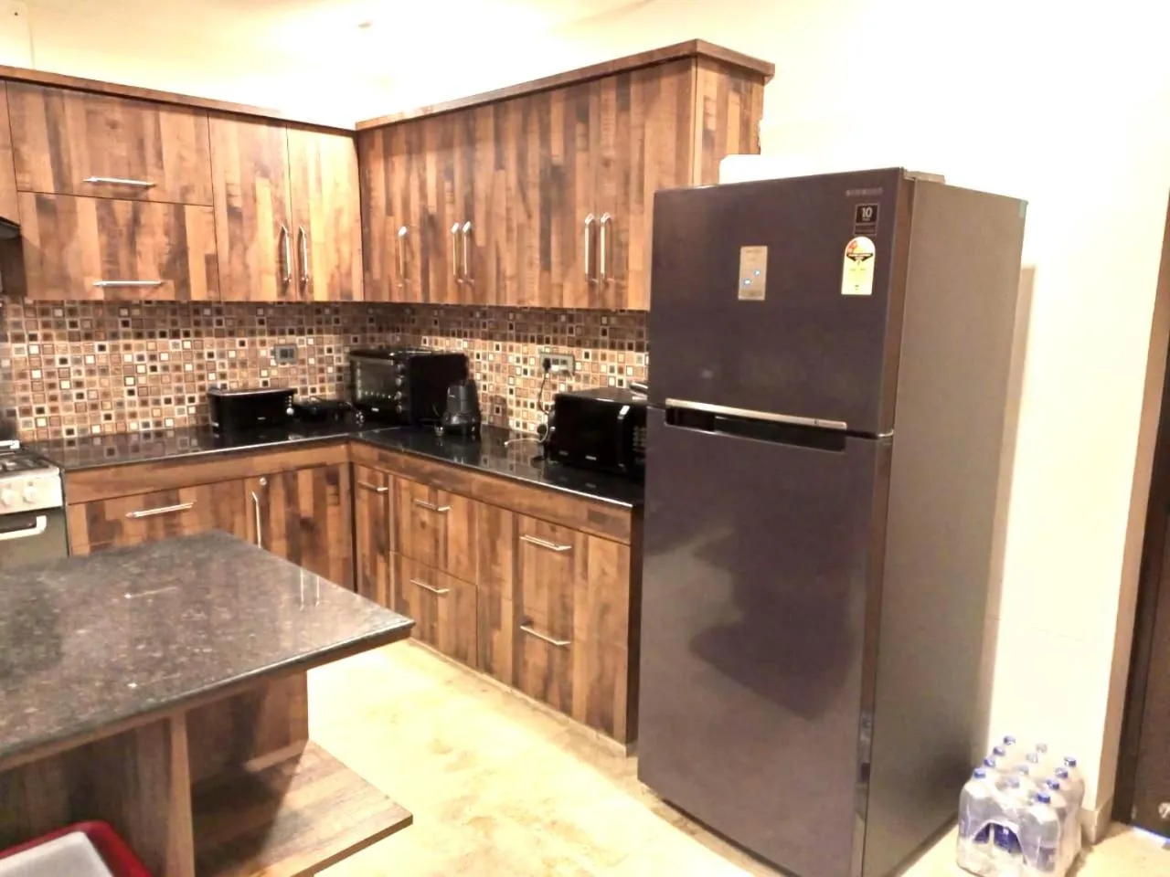 Kitchen or kitchenette in Captains Paradise Luxury Resort at Mukteshwar Hill Station