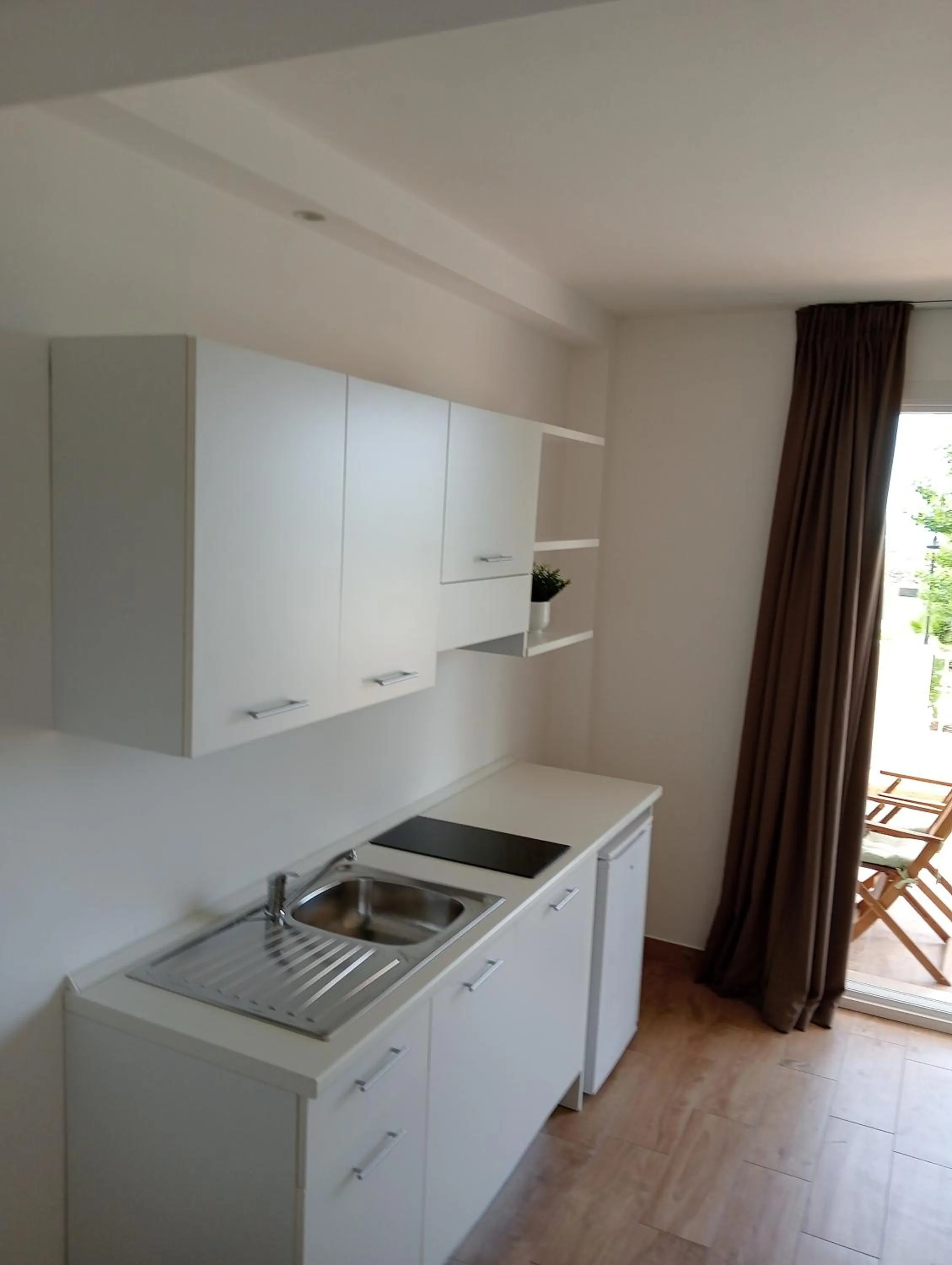 Kitchen or kitchenette in Hotel Flora