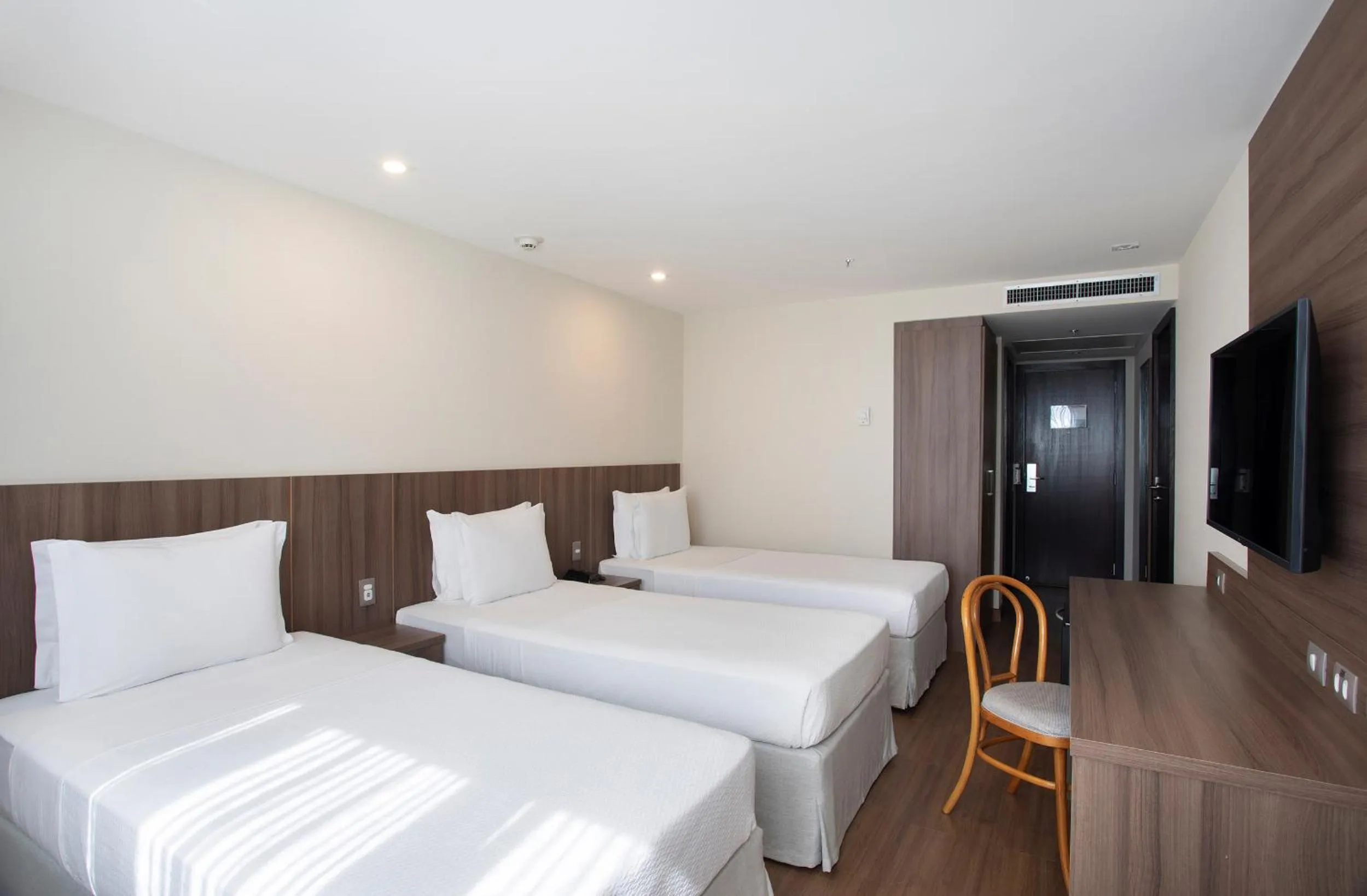 Bed in Windsor Tower Hotel