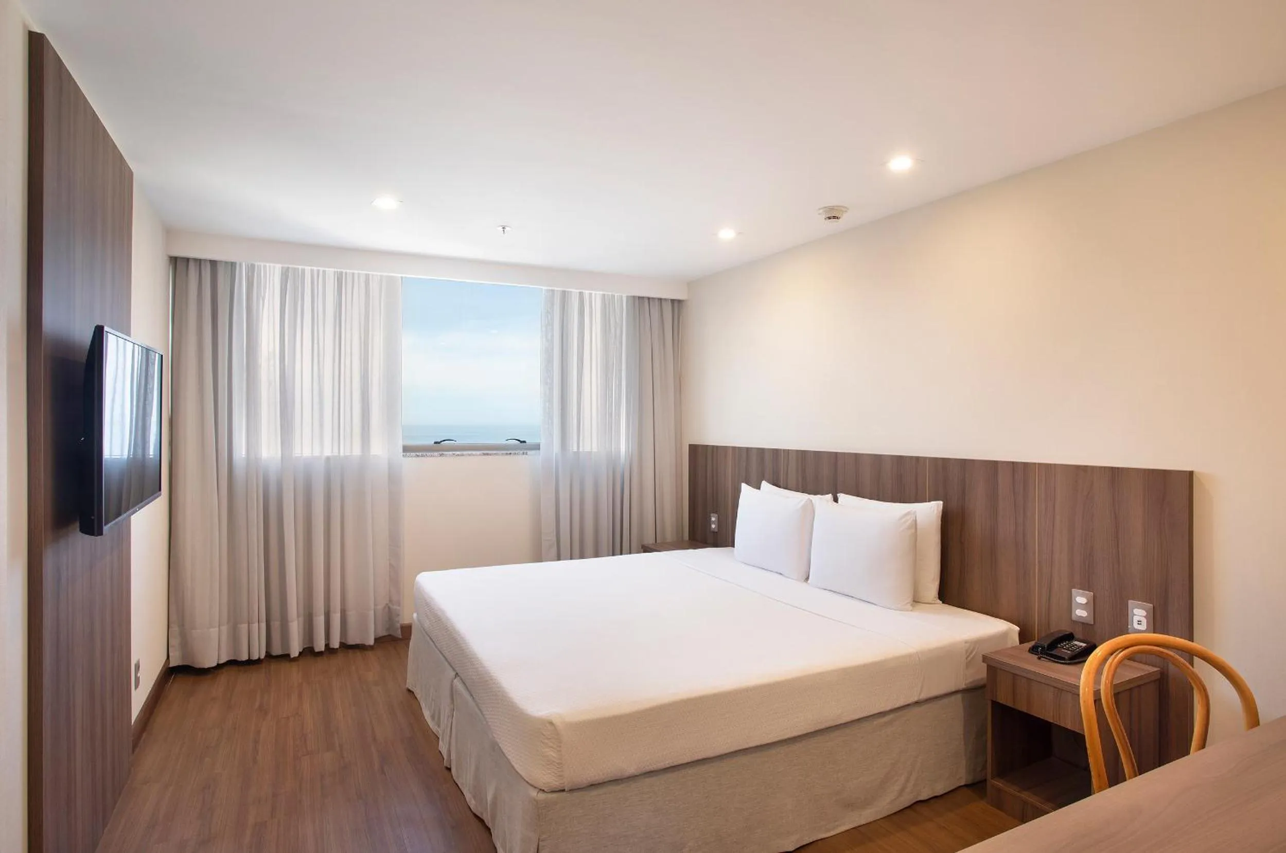 Photo of the whole room, Bed in Windsor Tower Hotel