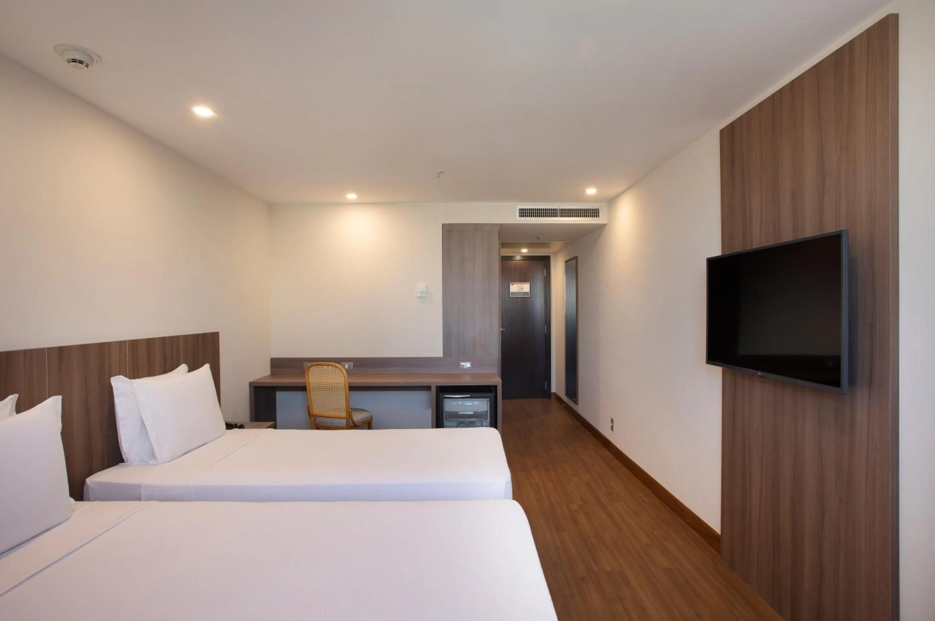 Bed in Windsor Tower Hotel