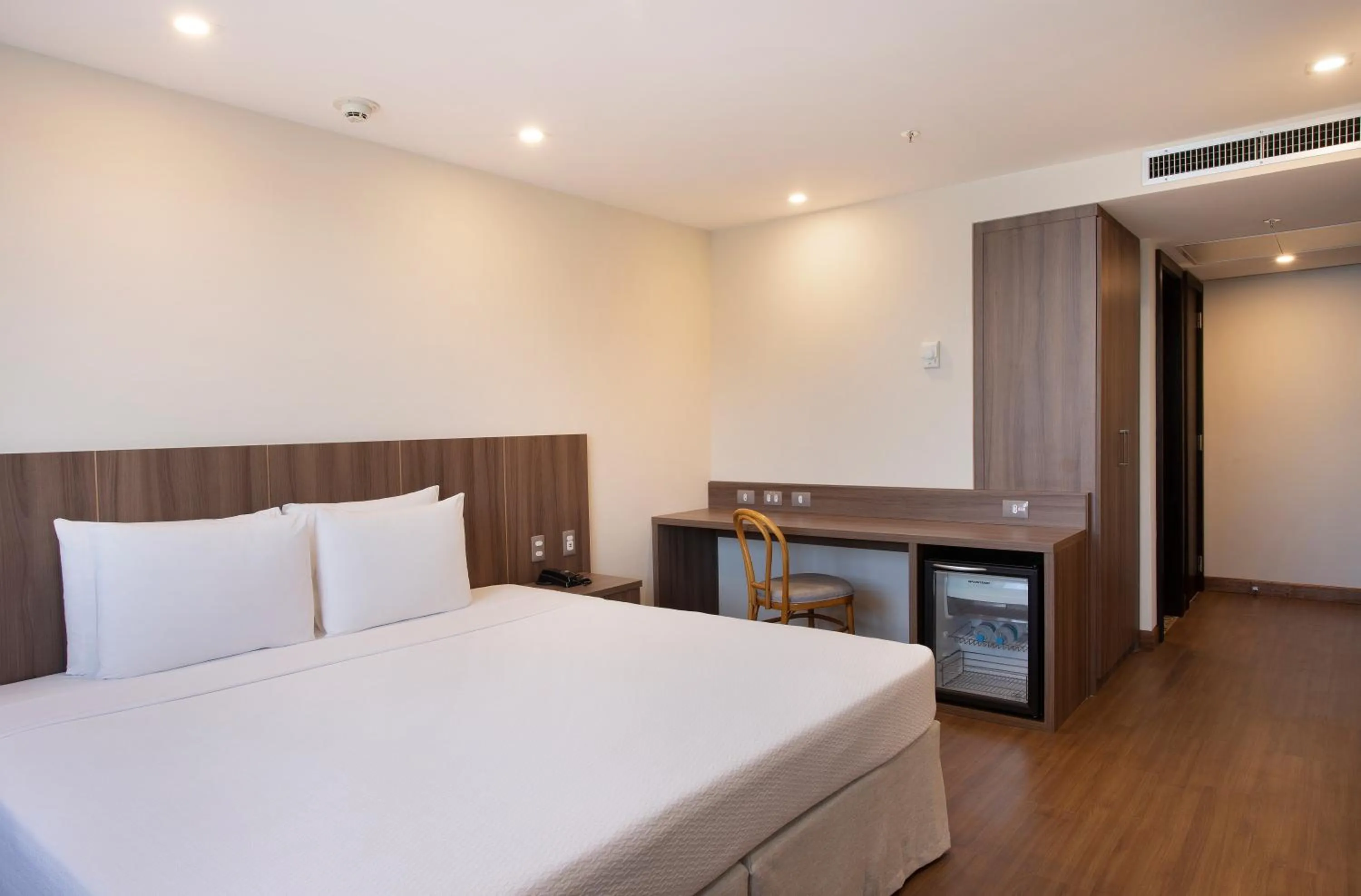 Bed in Windsor Tower Hotel