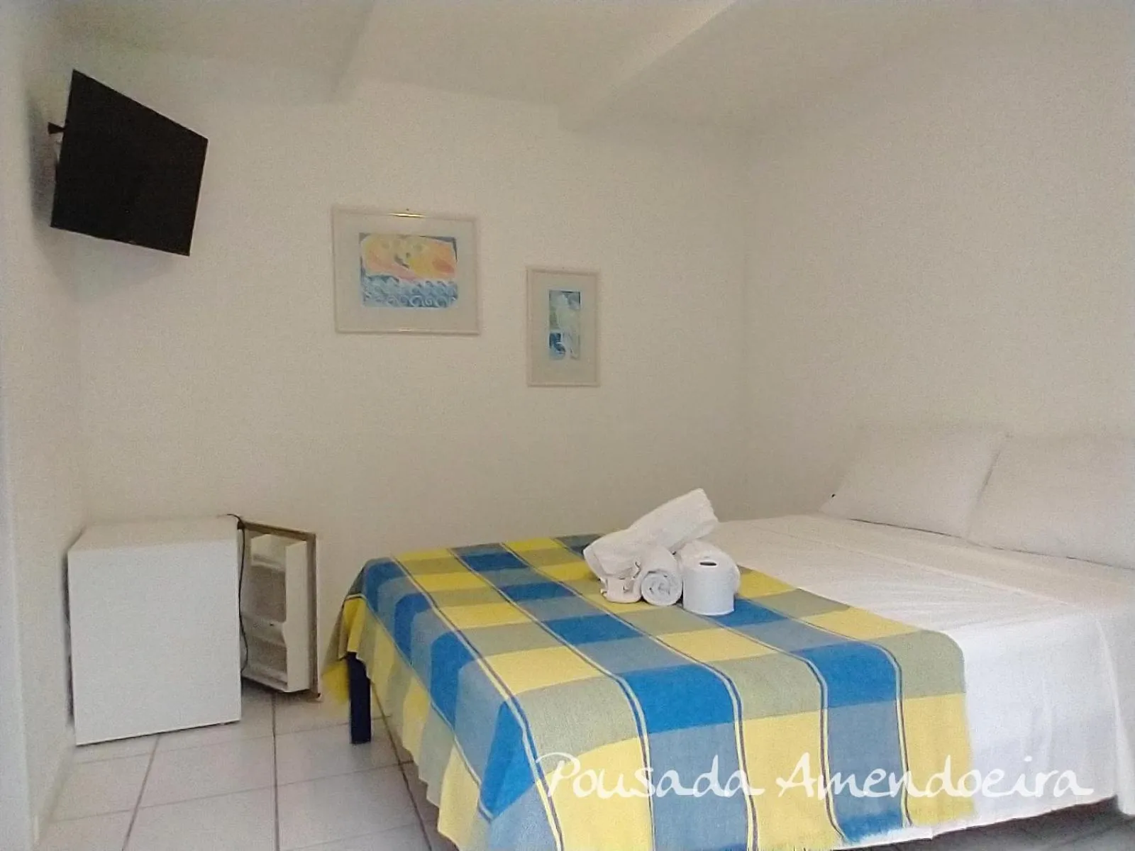 Bed in POUSADA AMENDOEIRA