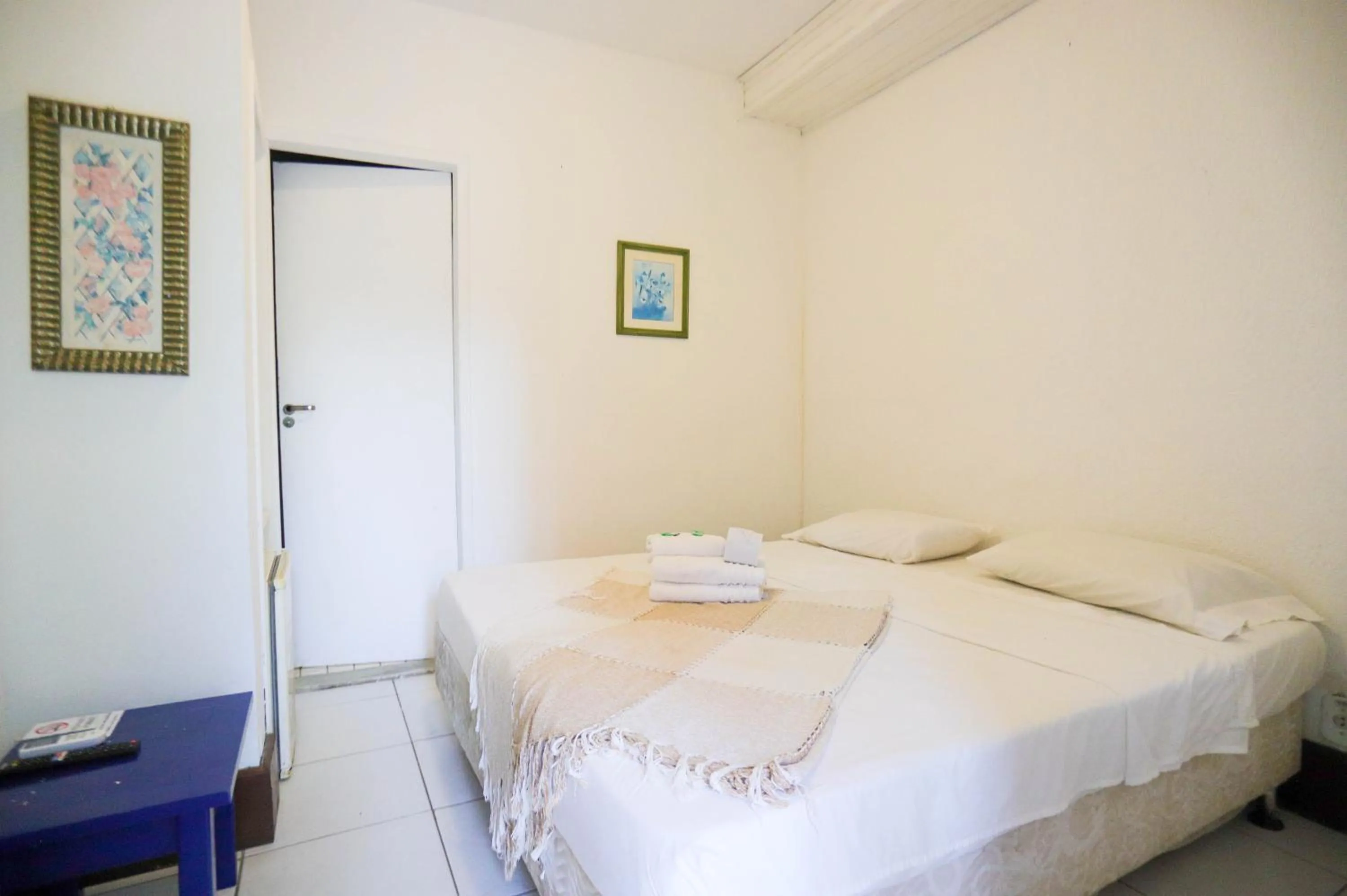 Bed in POUSADA AMENDOEIRA