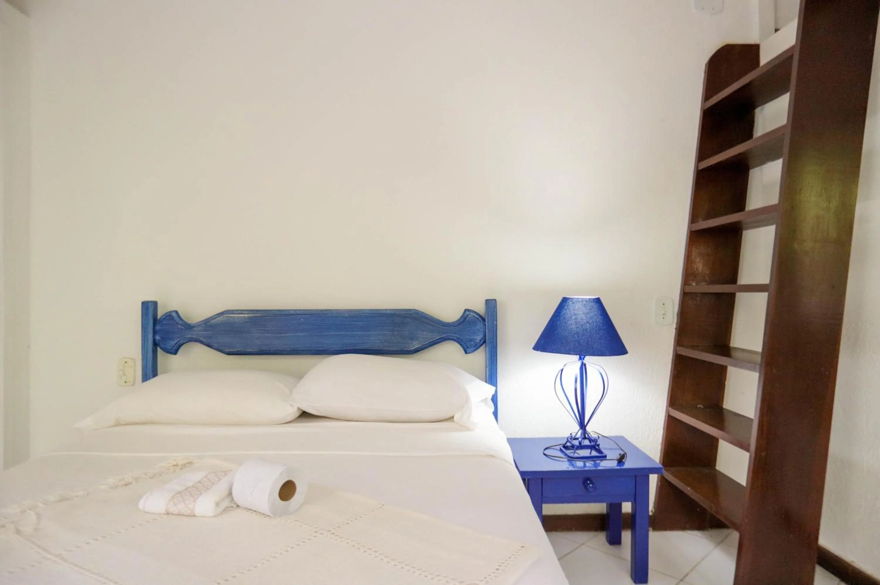 Bed in POUSADA AMENDOEIRA