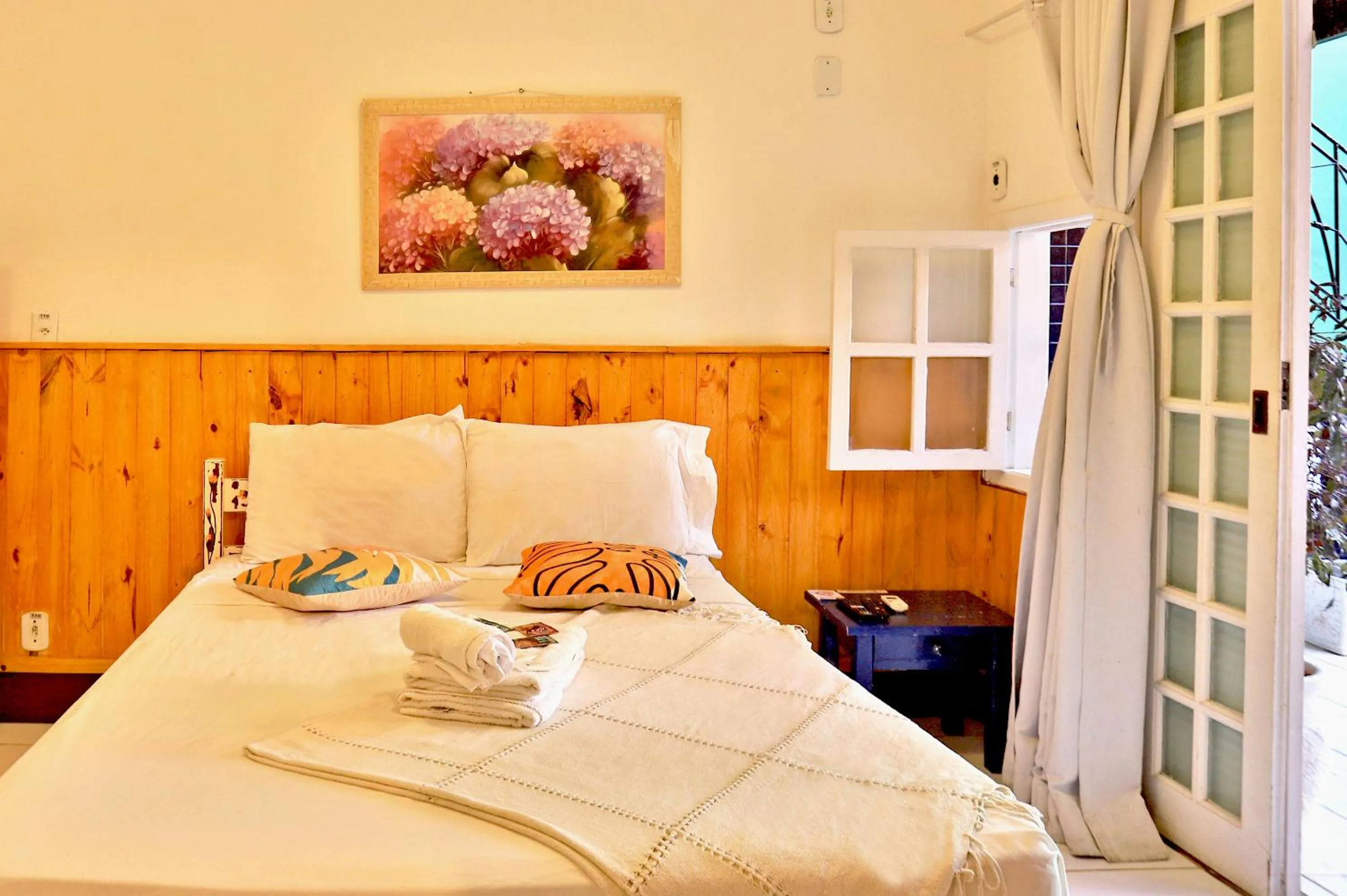 Photo of the whole room, Bed in POUSADA AMENDOEIRA