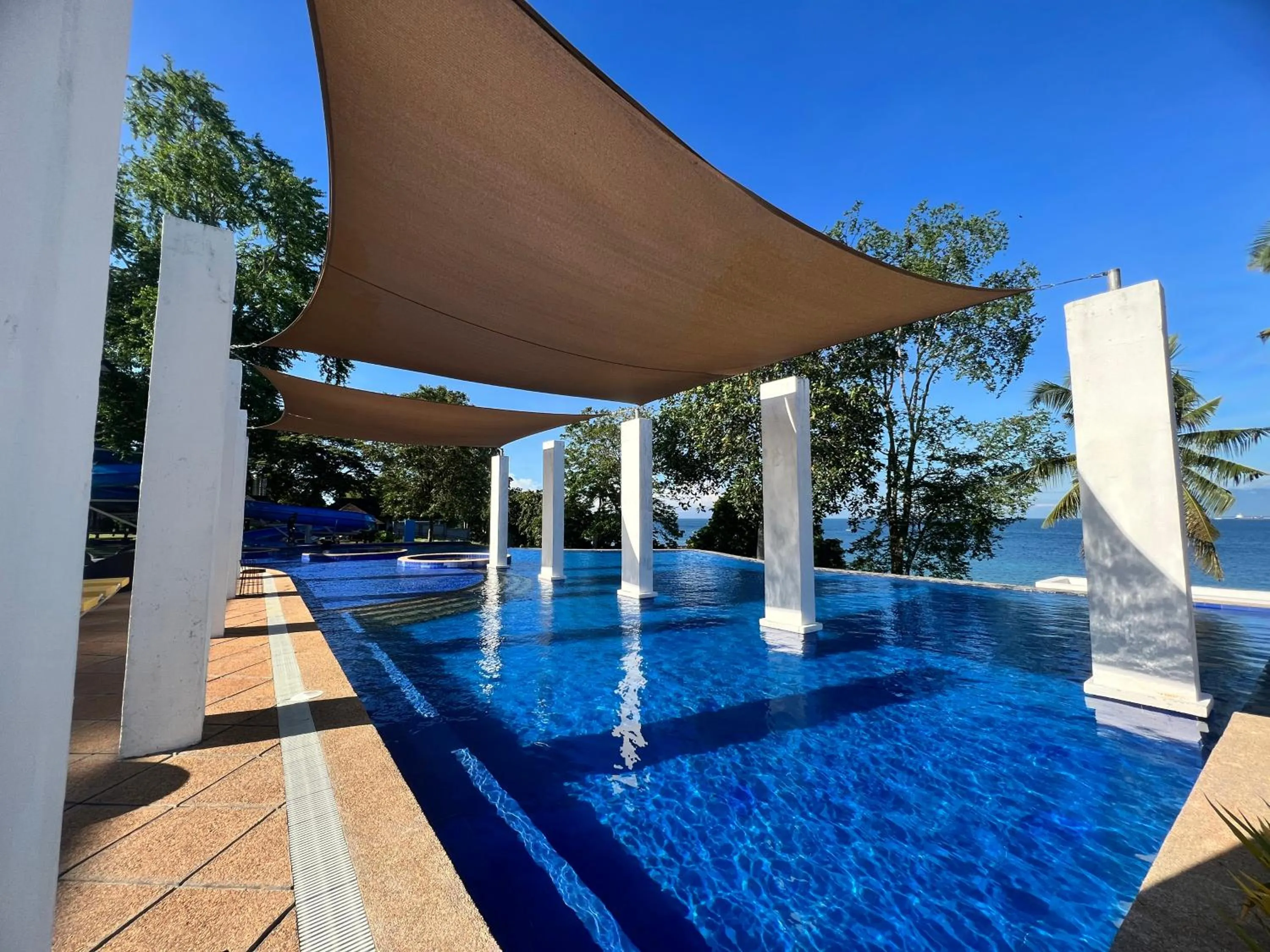 Pool view in Crusoe Cabins Costa Azalea