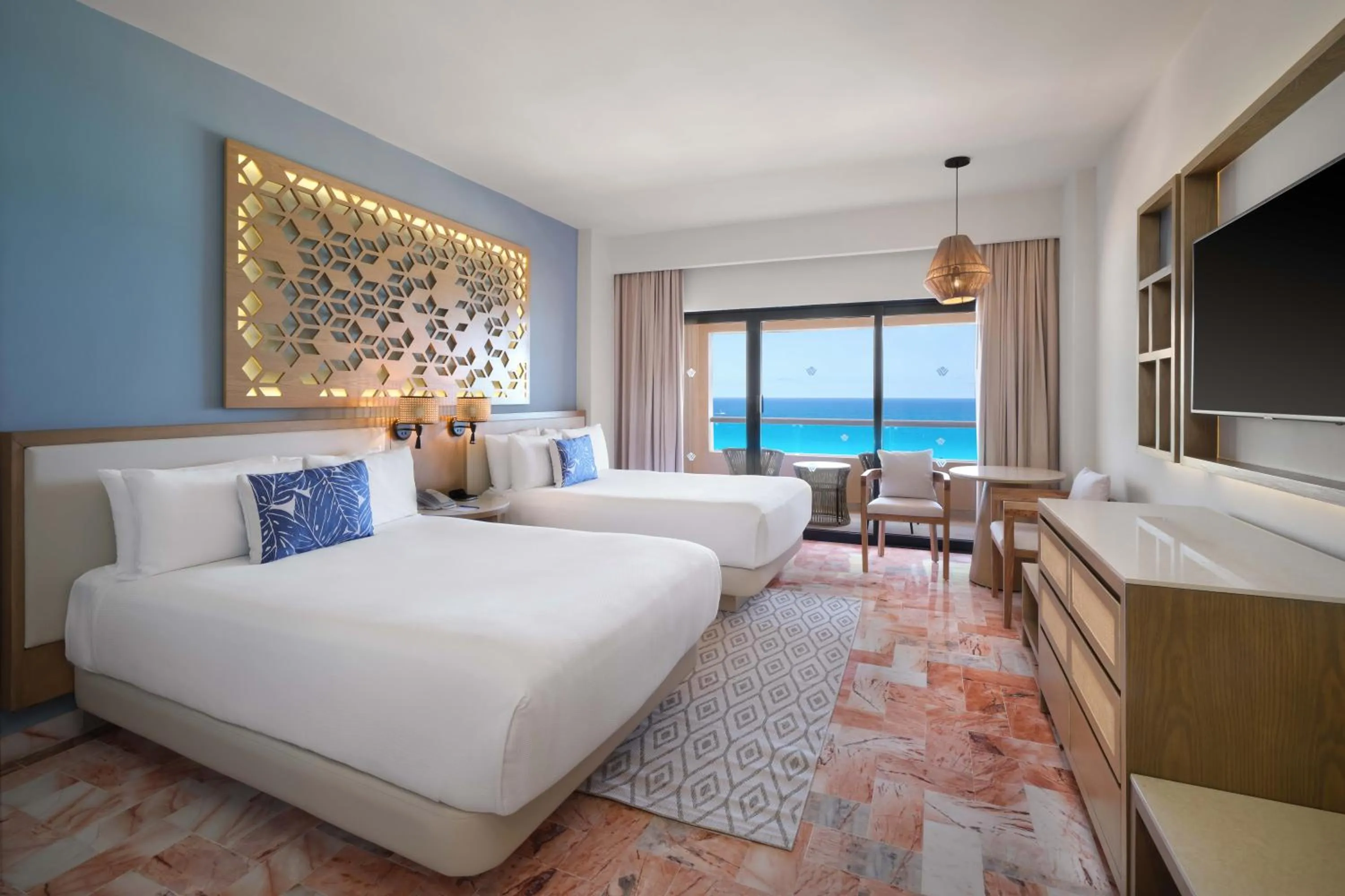 Bed in Wyndham Grand Cancun All Inclusive Resort & Villas