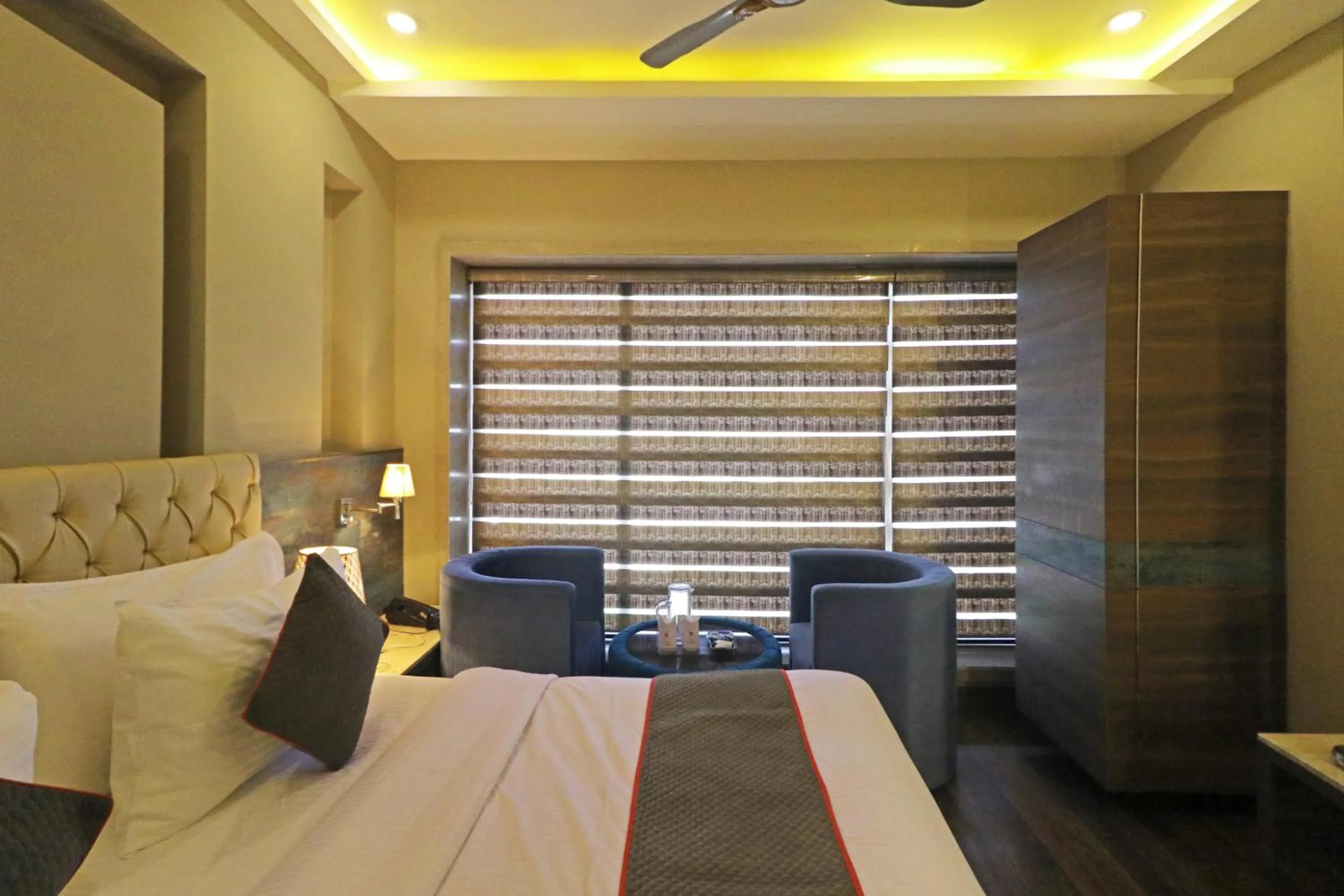 Photo of the whole room, Bed in The IVY Grand Hotel - 5 Minutes from Connaught Place and New Delhi Railway Station With Free Secured Parking