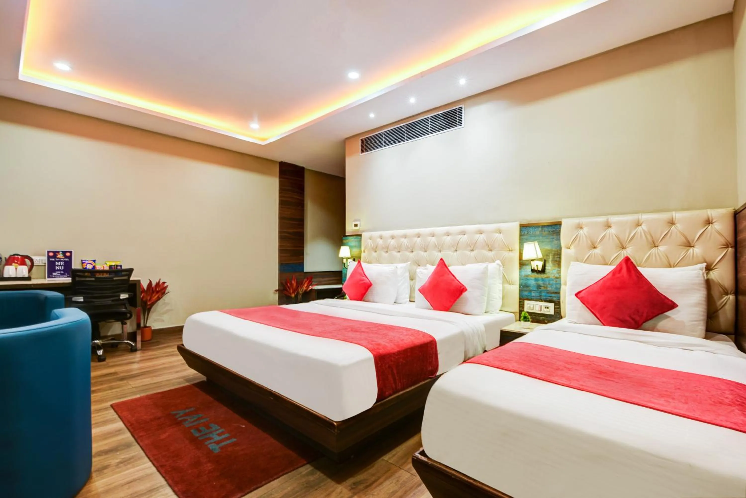 Photo of the whole room, Bed in The IVY Grand Hotel - 5 Minutes from Connaught Place and New Delhi Railway Station With Free Secured Parking