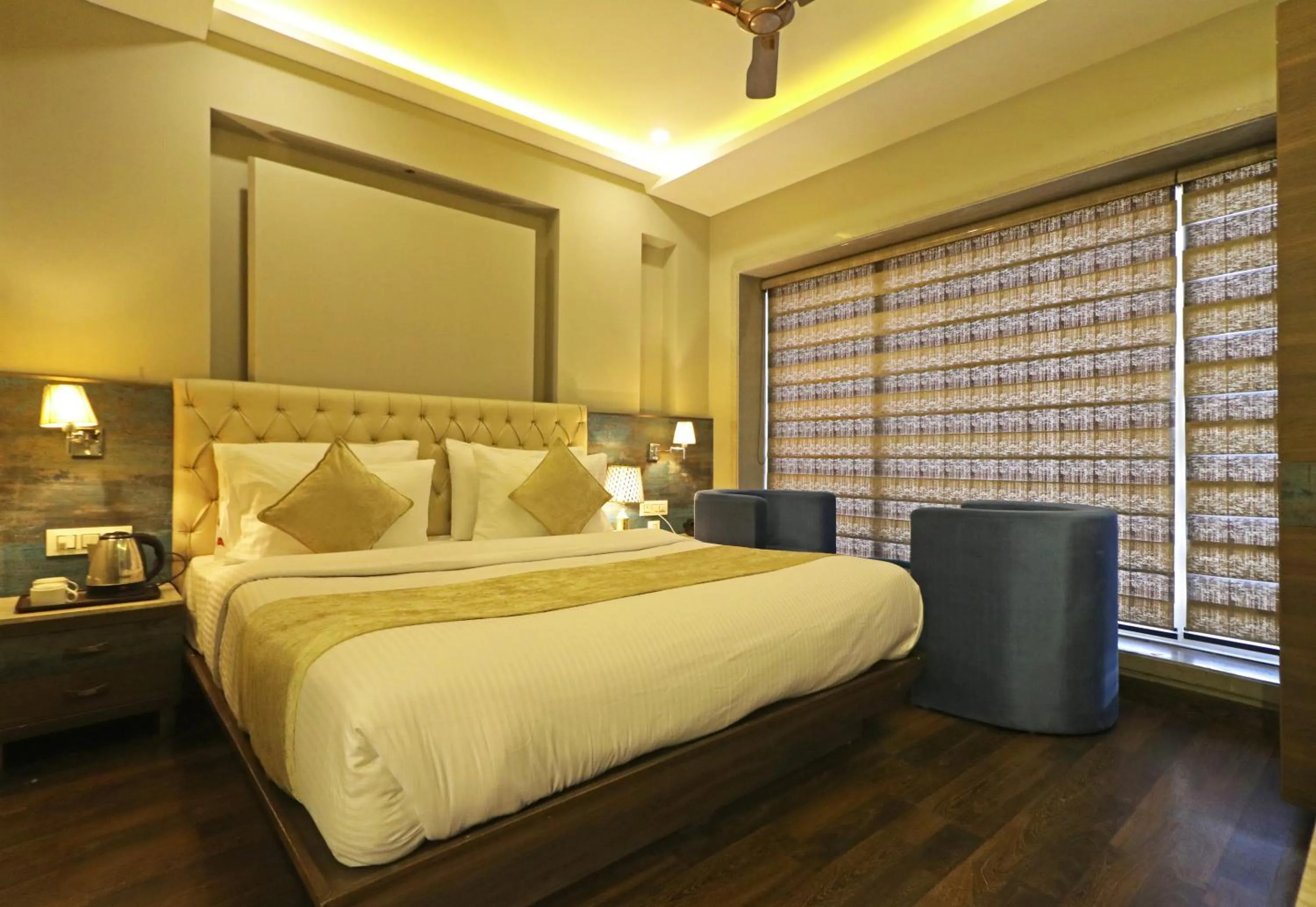 Photo of the whole room, Bed in The IVY Grand Hotel - 5 Minutes from Connaught Place and New Delhi Railway Station With Free Secured Parking