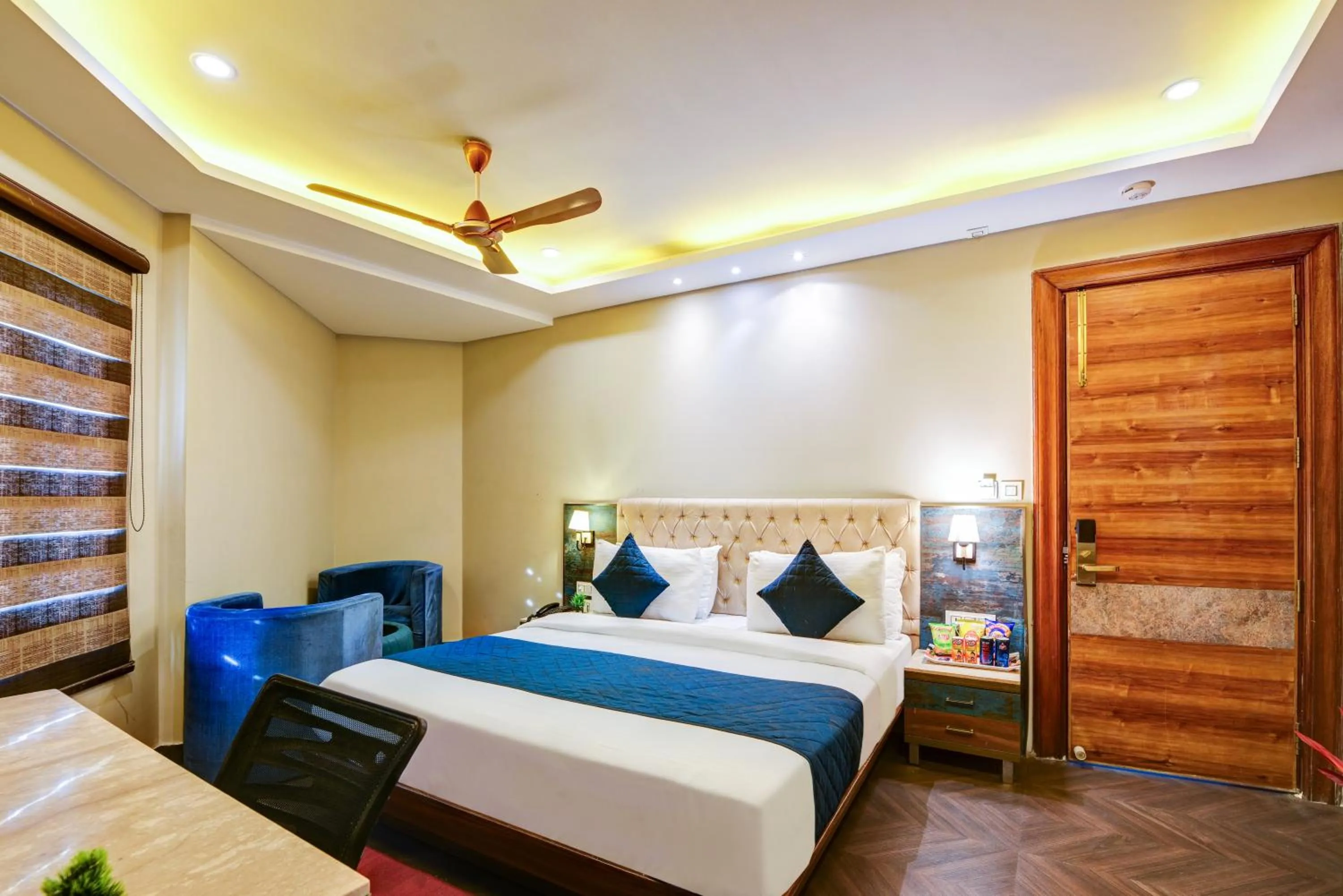 Photo of the whole room, Bed in The IVY Grand Hotel - 5 Minutes from Connaught Place and New Delhi Railway Station With Free Secured Parking