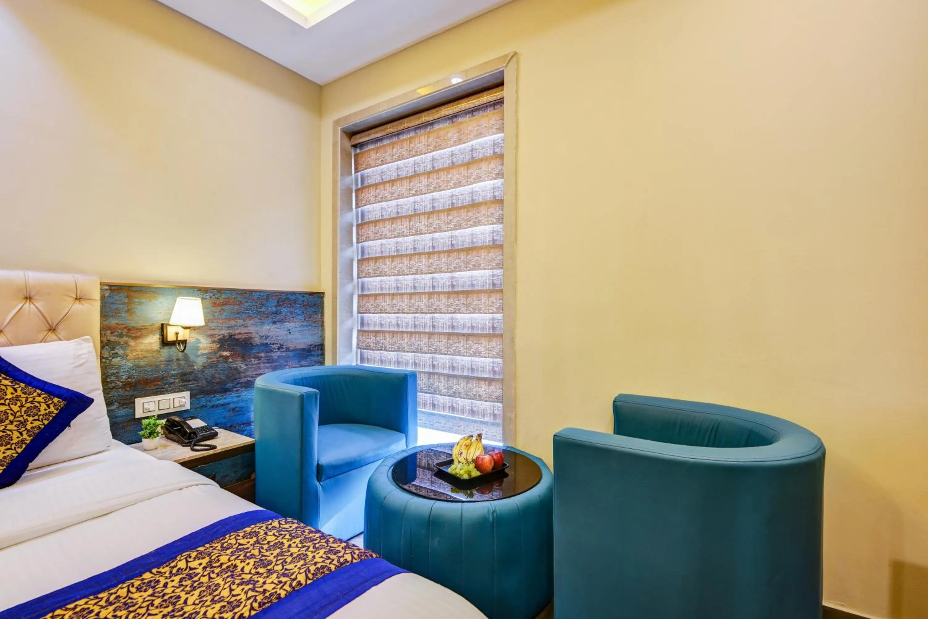 Seating area, Bed in The IVY Grand Hotel - 5 Minutes from Connaught Place and New Delhi Railway Station With Free Secured Parking