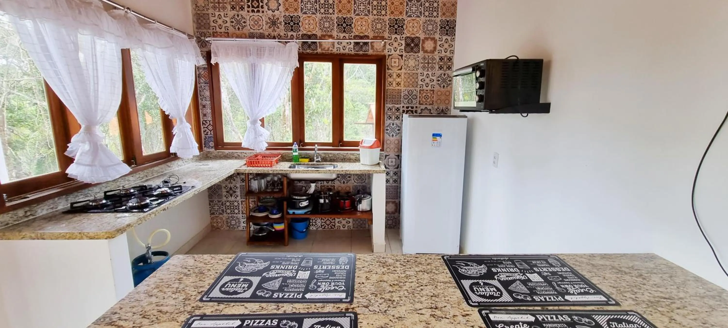 Kitchen or kitchenette in Chalés Pura Vida