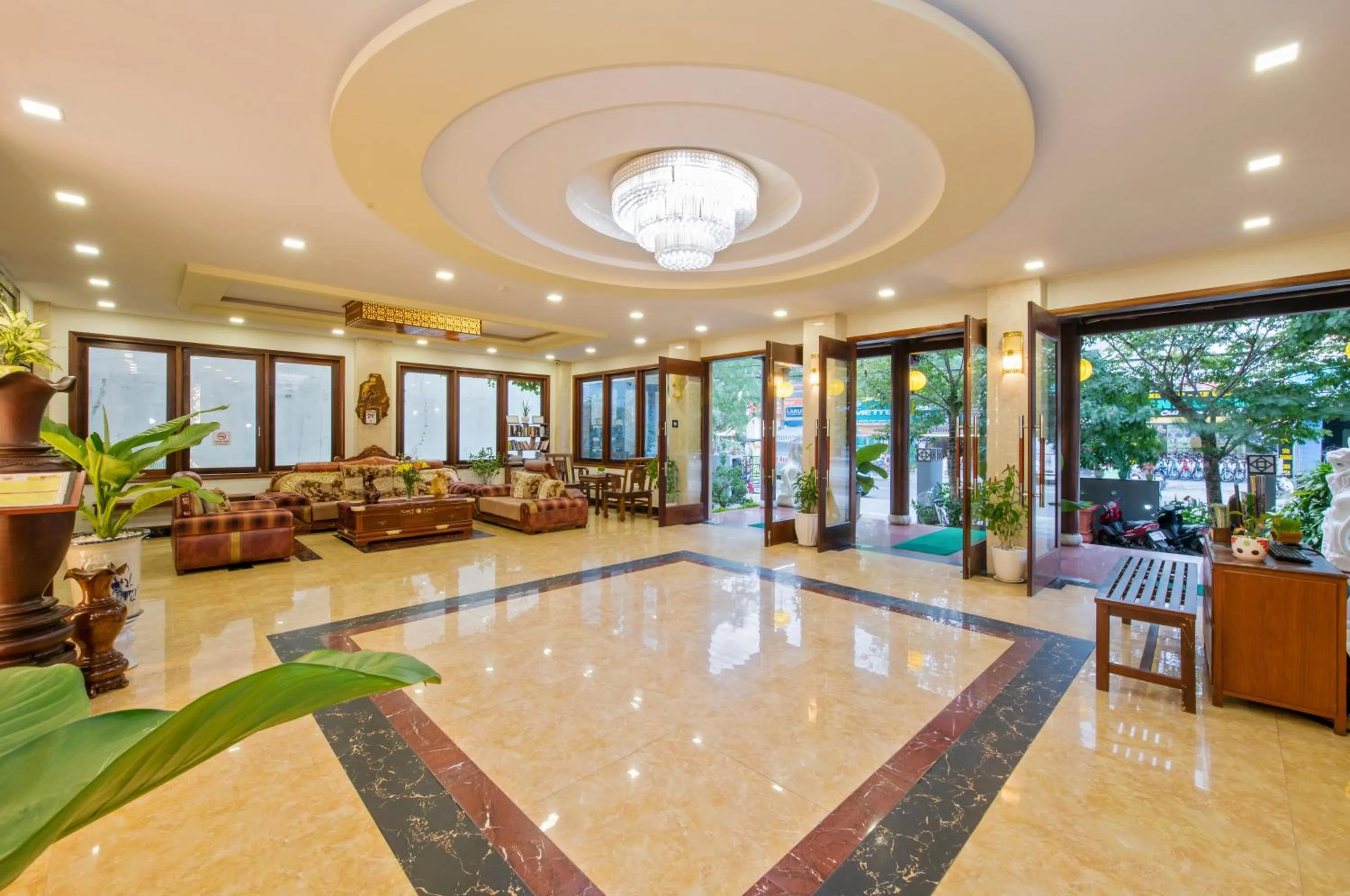 Communal lounge/ TV room in Kiman Hoi An Hotel