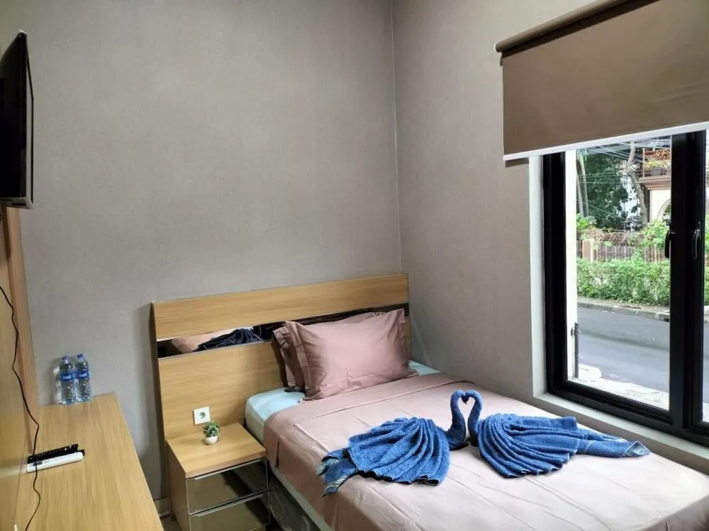 Bed in Cozy Residence Tomang