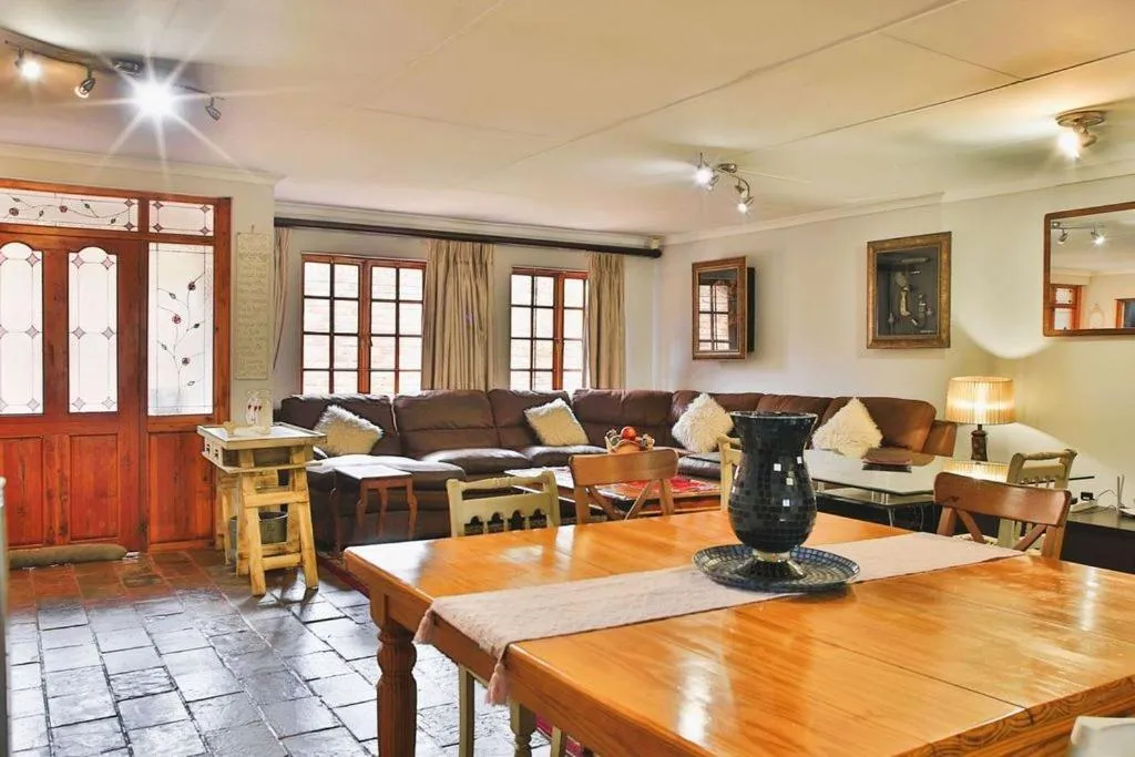 Communal lounge/ TV room in Mereke Manor