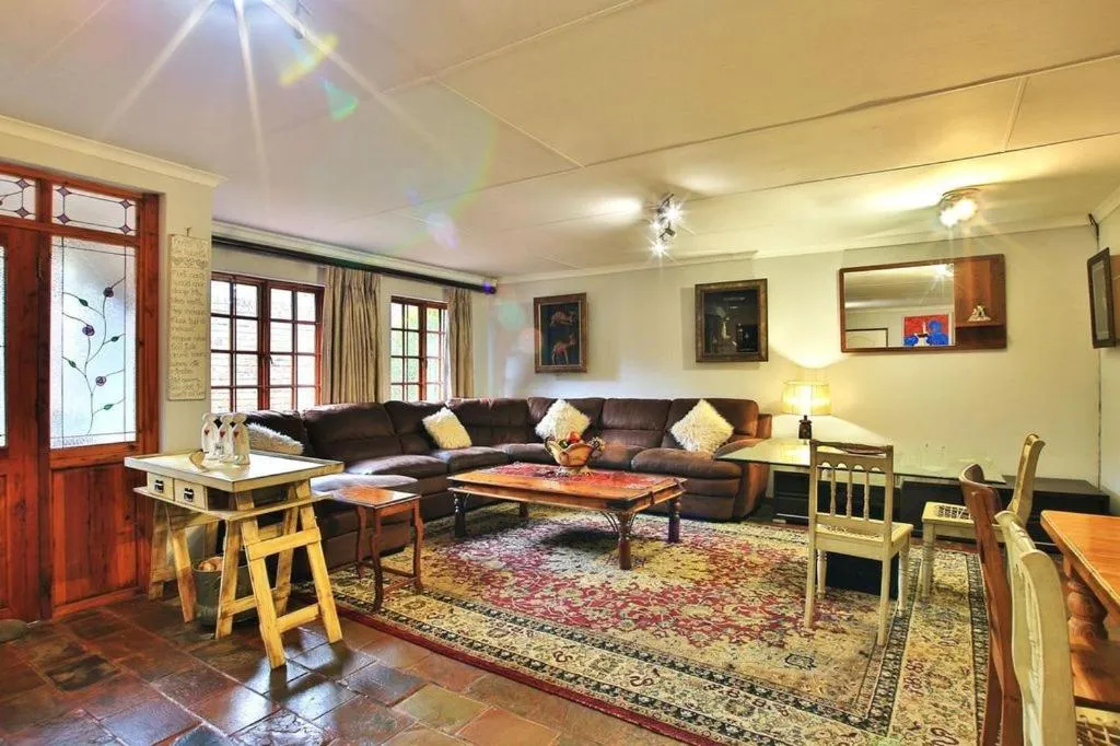 Communal lounge/ TV room in Mereke Manor