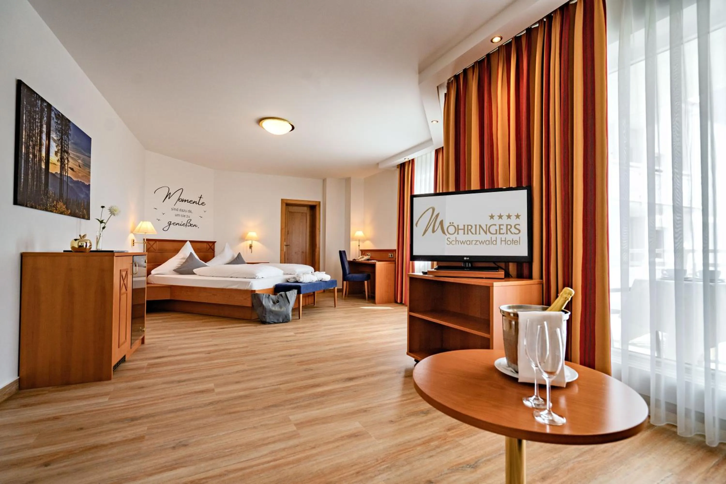 Photo of the whole room, Bed in Möhringers Schwarzwald Hotel